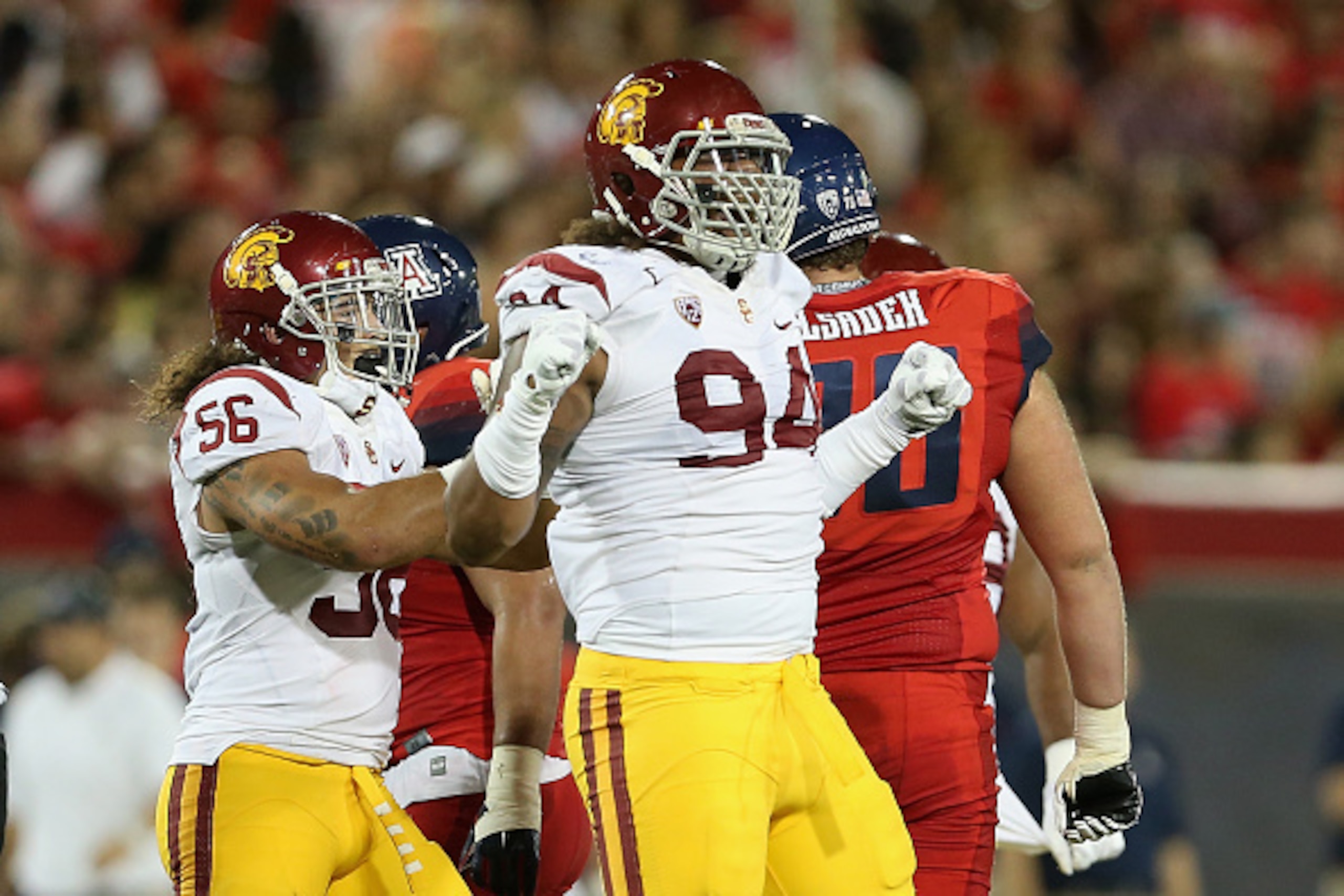 TUCSON, AZ - OCTOBER 11:  Defensive end Leonard Williams #94 of the USC Trojans reacts after a sack during the college football game against the Arizona Wildcats at Arizona Stadium on October 11, 2014 in Tucson, Arizona.  The Trojans defeatred the Wildcat
