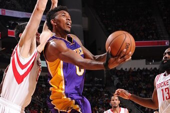 HOUSTON, TX - NOVEMBER 19:  Nick Young #0 of the Los Angeles Lakers shoots against the Houston Rockets on November 19, 2014 at the Toyota Center in Houston, Texas. NOTE TO USER: User expressly acknowledges and agrees that, by downloading and or using this