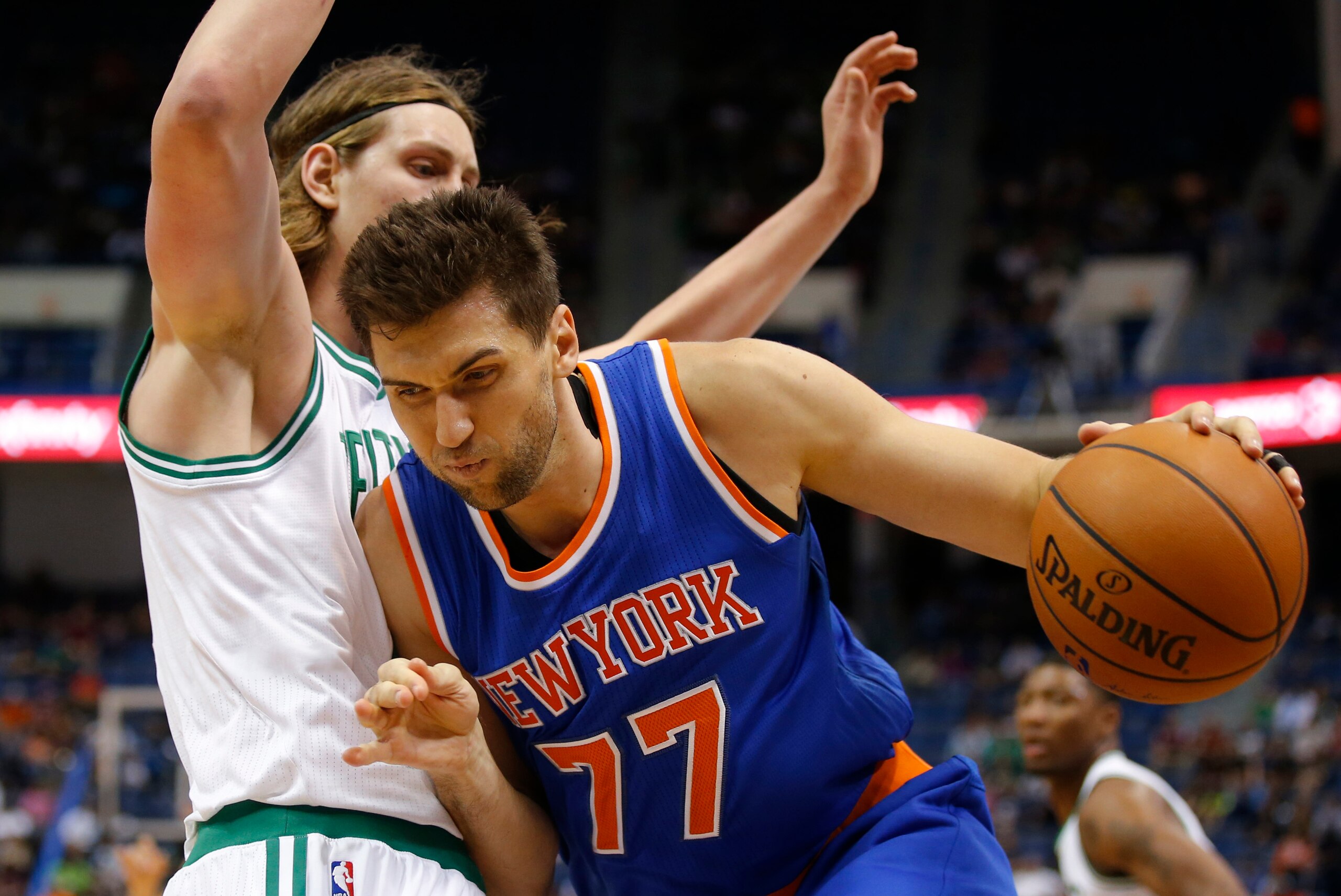 Oct 8, 2014; Hartford, CT, USA; New York Knicks center Andrea Bargnani (77) drives the ball against Boston Celtics center Kelly Olynyk (41) in the first half at XL Center. Mandatory Credit: David Butler II-USA TODAY Sports