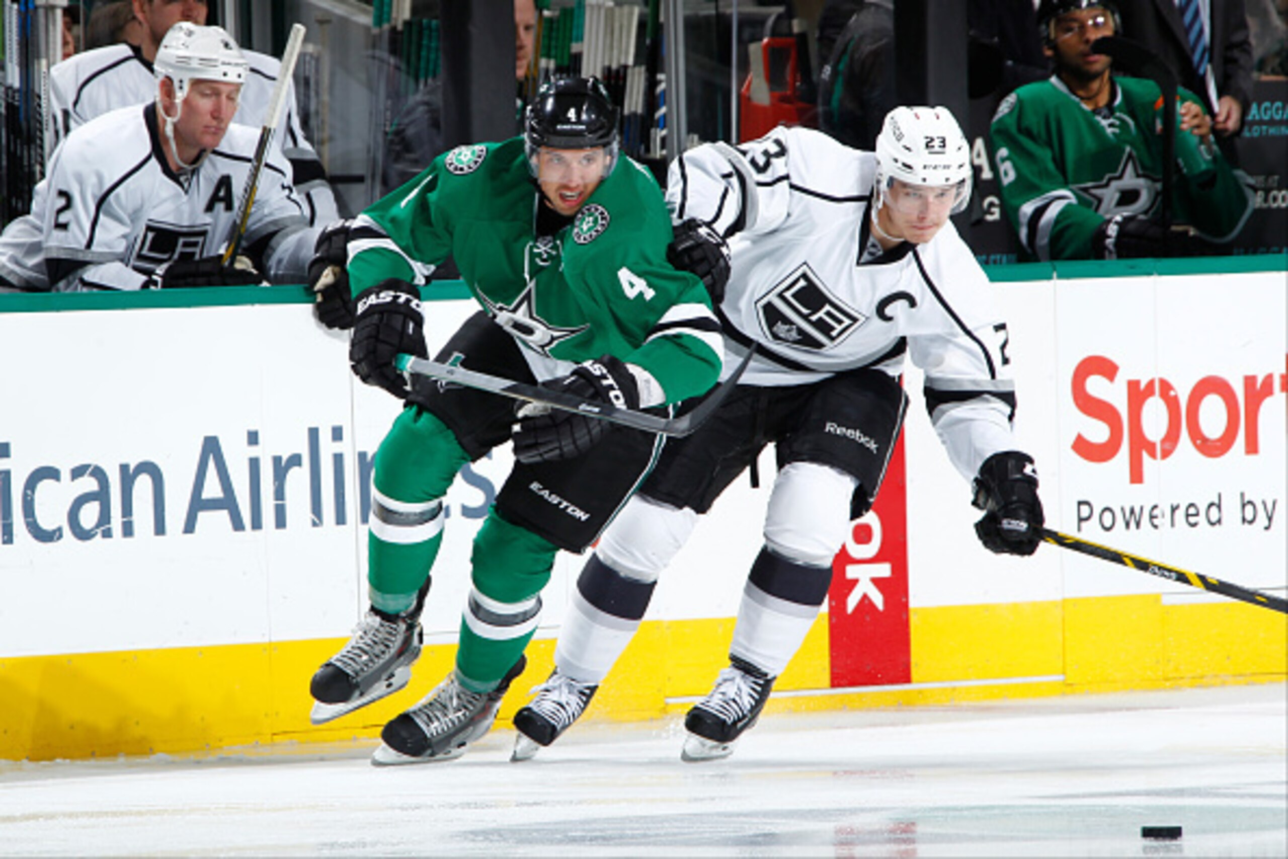 DALLAS, TX - NOVEMBER 4: Brenden Dillon #4 of the Dallas Stars fights for space against Dustin Brown #23 of the Los Angeles Kings at the American Airlines Center on November 4, 2014 in Dallas, Texas. (Photo by Glenn James/NHLI via Getty Images)
