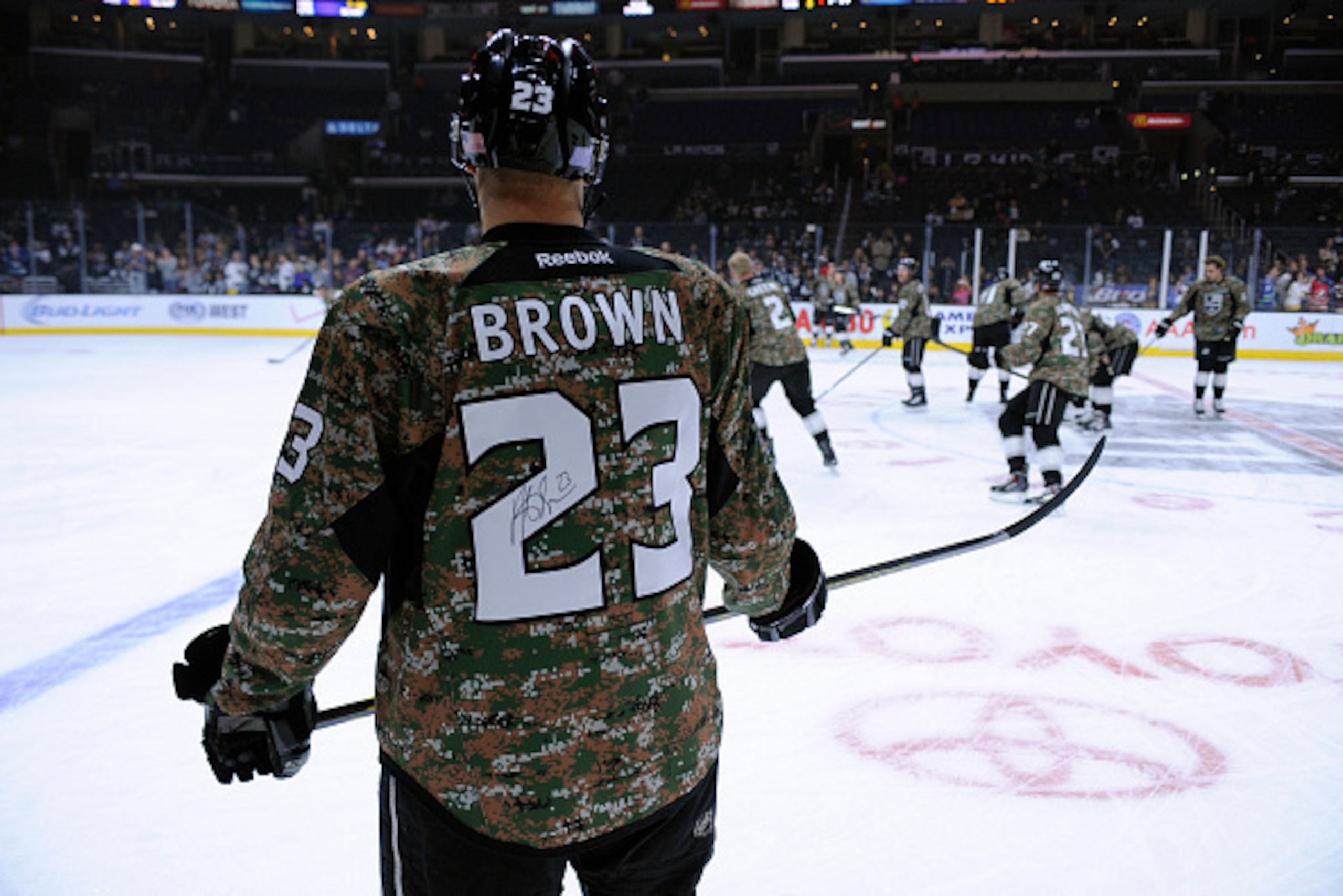 LOS ANGELES, CA - NOVEMBER 8: Dustin Brown #23 of the Los Angeles Kings stands on the ice before a game against the Vancouver Canucks at STAPLES Center on November 8, 2014 in Los Angeles, California. (Photo by Juan Ocamp/NHLI via Getty Images)