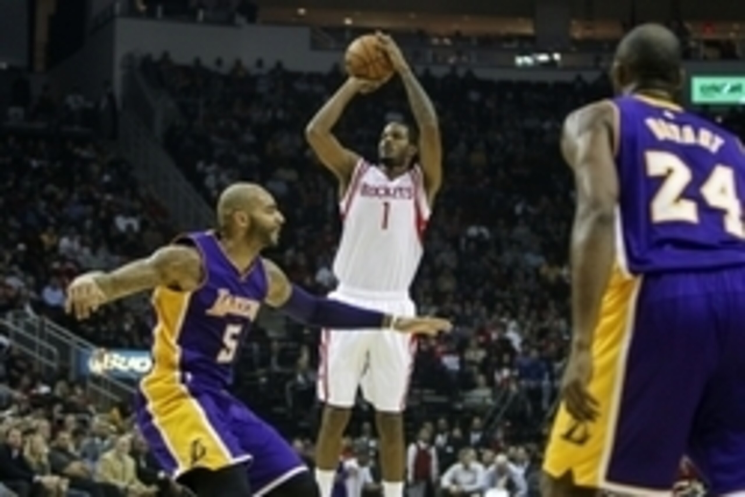 Nov 19, 2014; Houston, TX, USA; Houston Rockets forward Trevor Ariza (1) shoots during the first half against the Los Angeles Lakers at Toyota Center. Mandatory Credit: Troy Taormina-USA TODAY Sports