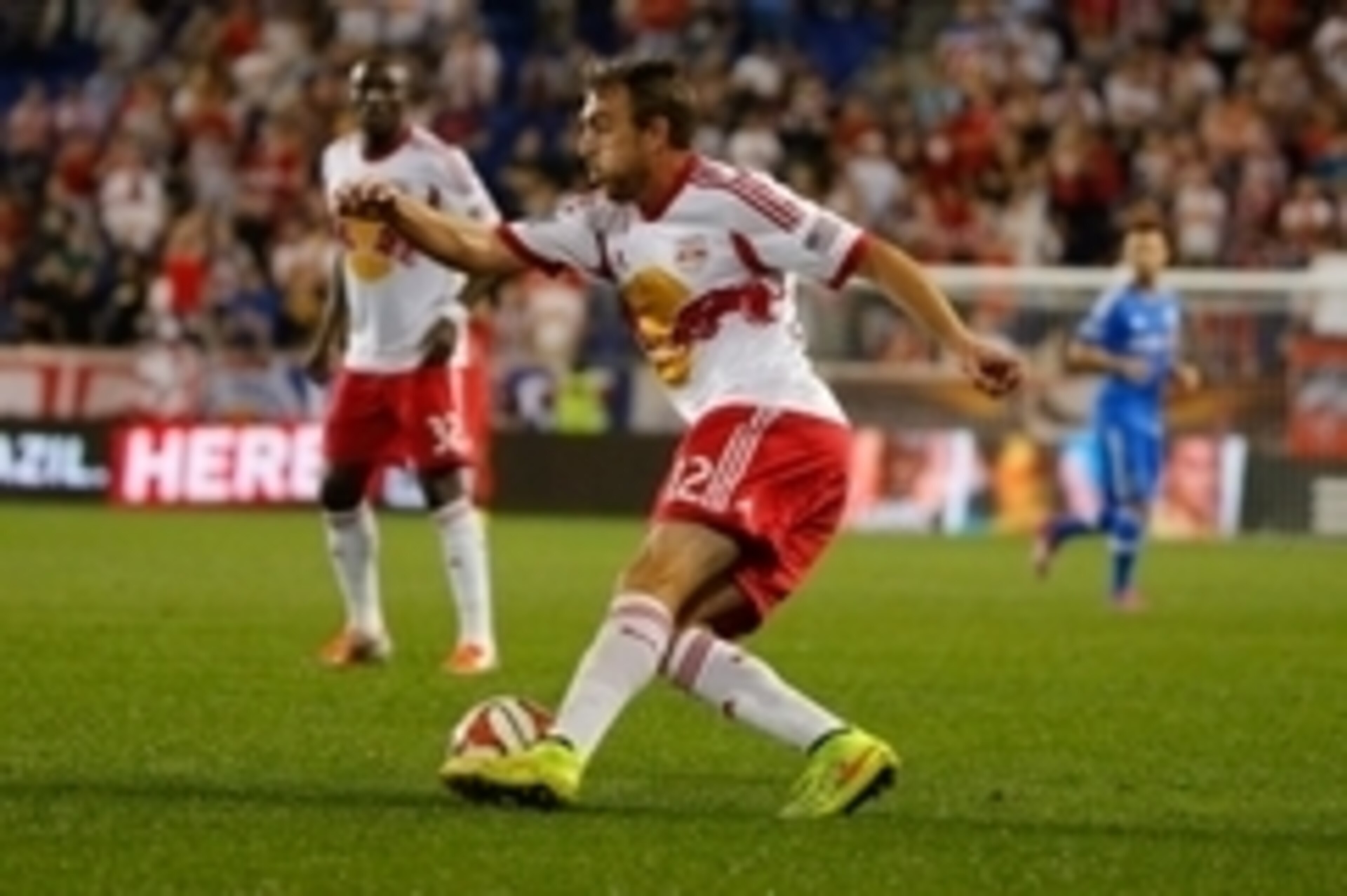 Aug 23, 2014; Harrison, NJ, USA;  New York Red Bulls midfielder Eric Alexander (12) handles the ball during the second half against the Montreal Impact at Red Bull Arena. New York Red Bulls defeat the Montreal Impact 4-2. Mandatory Credit: Jim O'Connor-US