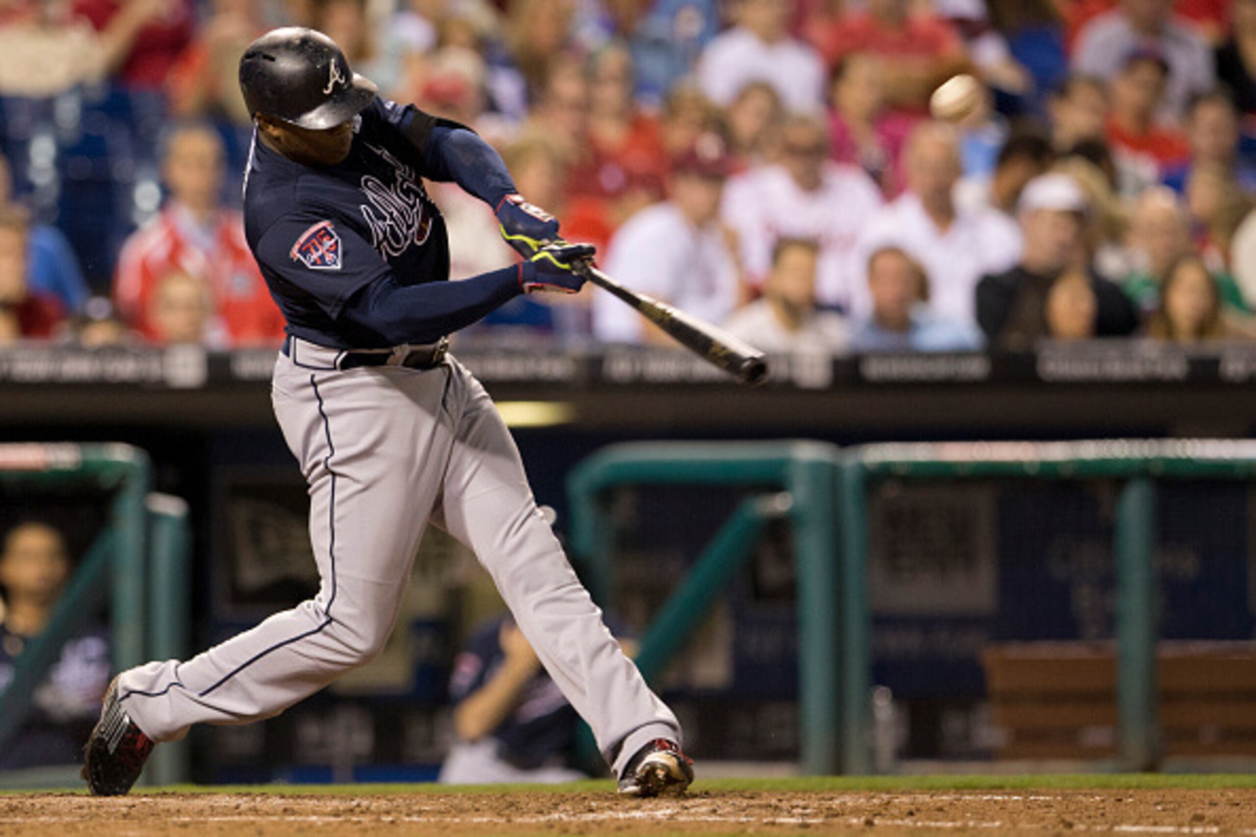 PHILADELPHIA, PA - SEPTEMBER 27: Left fielder Justin Upton #8 of the Atlanta Braves hits a two run home run in the top of the seventh inning against the Philadelphia Phillies on September 27, 2014 at Citizens Bank Park in Philadelphia, Pennsylvania. The B