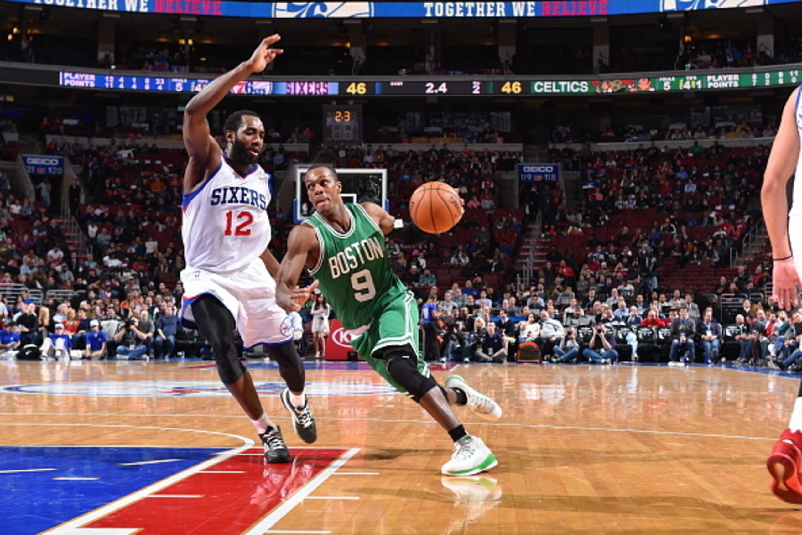 PHILADELPHIA, PA -  NOVEMBER 19: Rajon Rondo #9 of the Boston Celtics drives to the basket against Luc Richard Mbah a Moute #12 of the Philadelphia 76ers during the game on November 19, 2014 at Wells Fargo Center in Philadelphia, Pennsylvania. NOTE TO USE