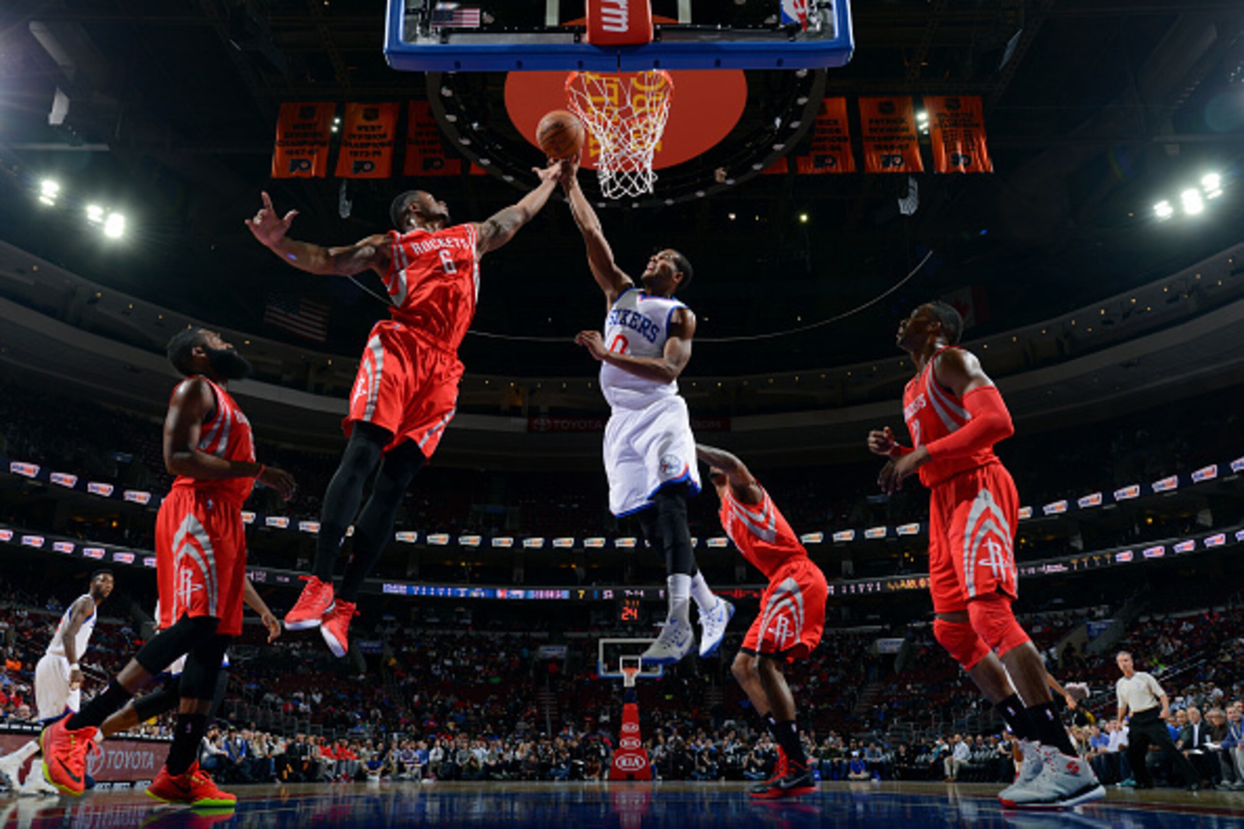 PHILADELPHIA, PA - NOVEMBER 3: Terrence Jones #6 of the Houston Rockets grabs a rebound against Brandon Davies #0 of the Philadelphia 76ers on November 3, 2014 at the Wells Fargo Center in Philadelphia, Pennsylvania. NOTE TO USER: User expressly acknowled