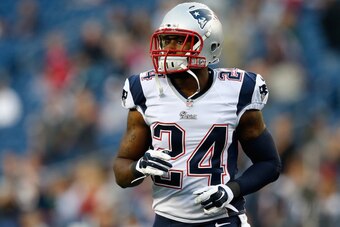 FOXBORO, MA - AUGUST 22:  Darrelle Revis #24 of the New England Patriots runs into position during before a game with the Carolina Panthers at Gillette Stadium on August 22, 2014 in Foxboro, Massachusetts. (Photo by Jim Rogash/Getty Images)