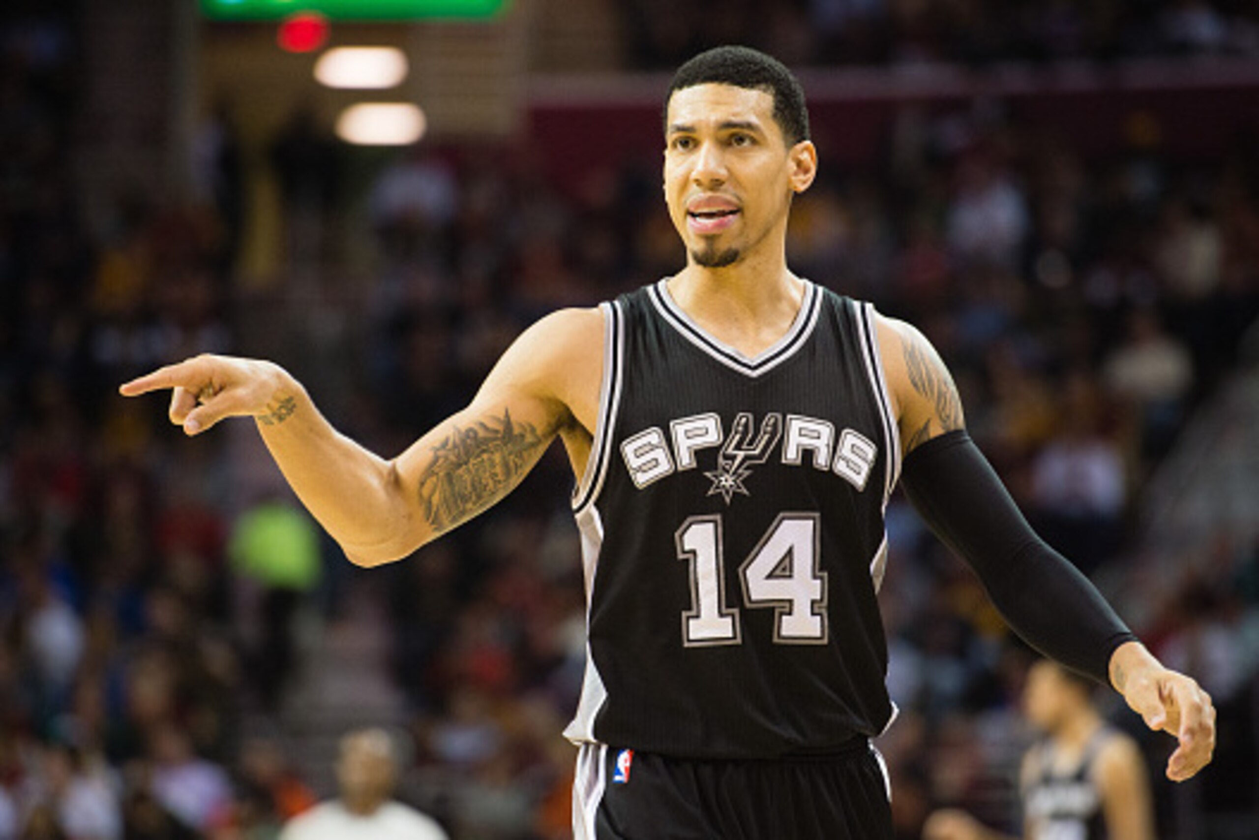 CLEVELAND, OH - NOVEMBER 19: Danny Green #14 of the San Antonio Spurs talks to his teammates during the first half against the Cleveland Cavaliers at Quicken Loans Arena on November 19, 2014 in Cleveland, Ohio. User expressly acknowledges and agrees that,