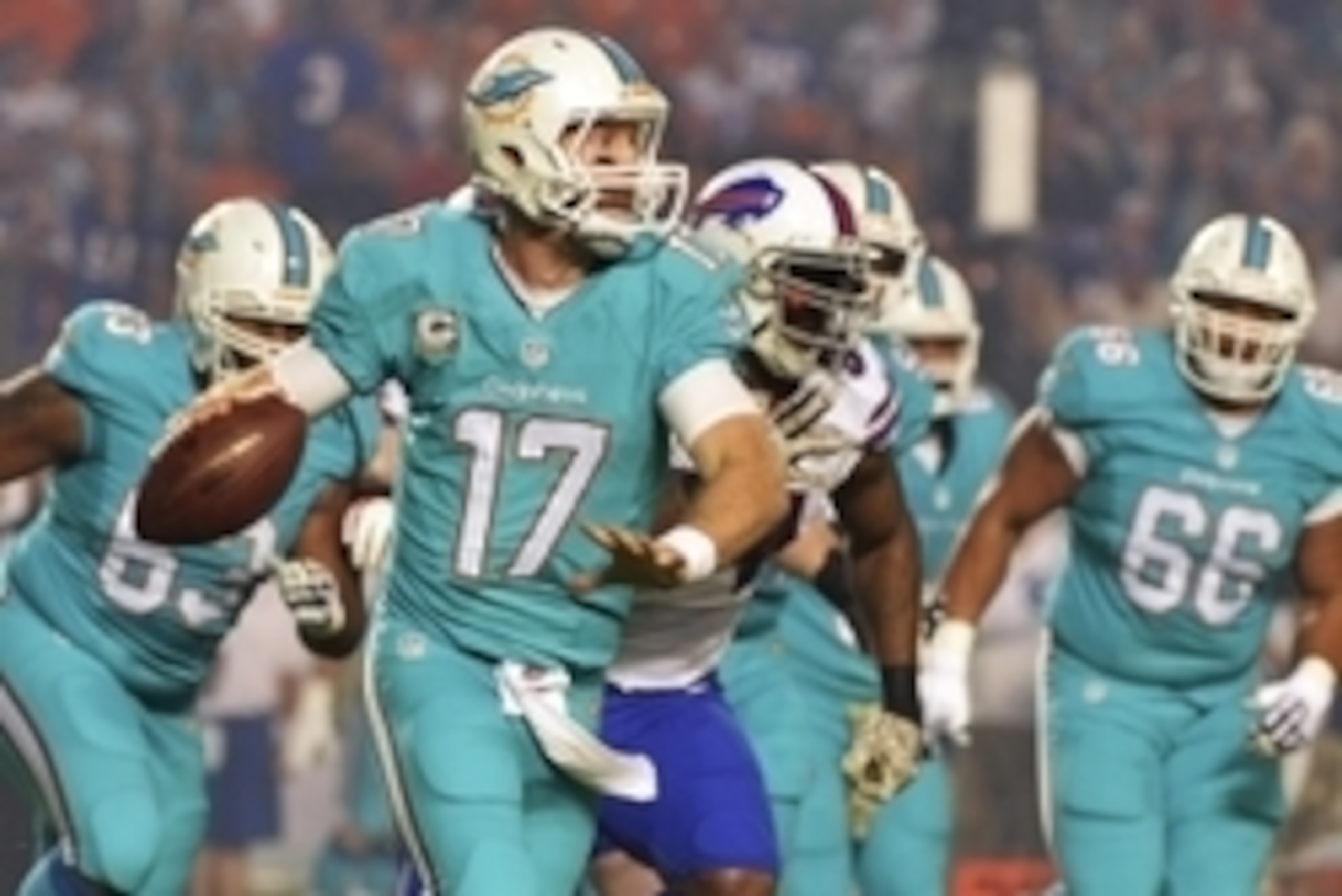 Nov 13, 2014; Miami Gardens, FL, USA; Miami Dolphins quarterback Ryan Tannehill (17) throws a pass against the Buffalo Bills during the first quarter at Sun Life Stadium. Mandatory Credit: Steve Mitchell-USA TODAY Sports