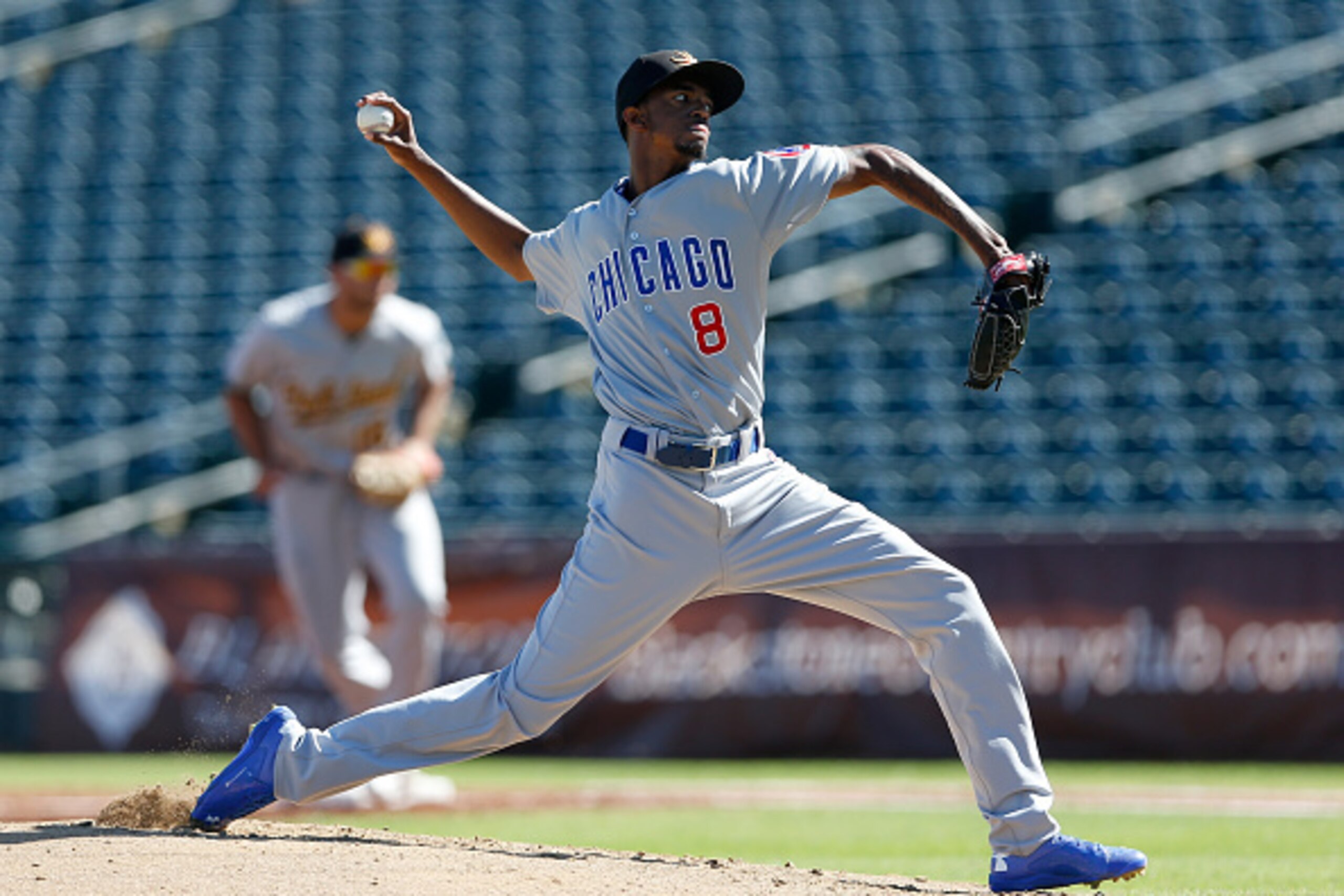 SURPRISE, AZ - OCTOBER 21:  C.J. Edwards #8 (Chicago Cubs) of the Mesa Solar Sox pitches against the Surprise Saguaros during the Arizona Fall League game at Surprise Stadium on October 21, 2014 in Surprise, Arizona.  (Photo by Christian Petersen/Getty Im