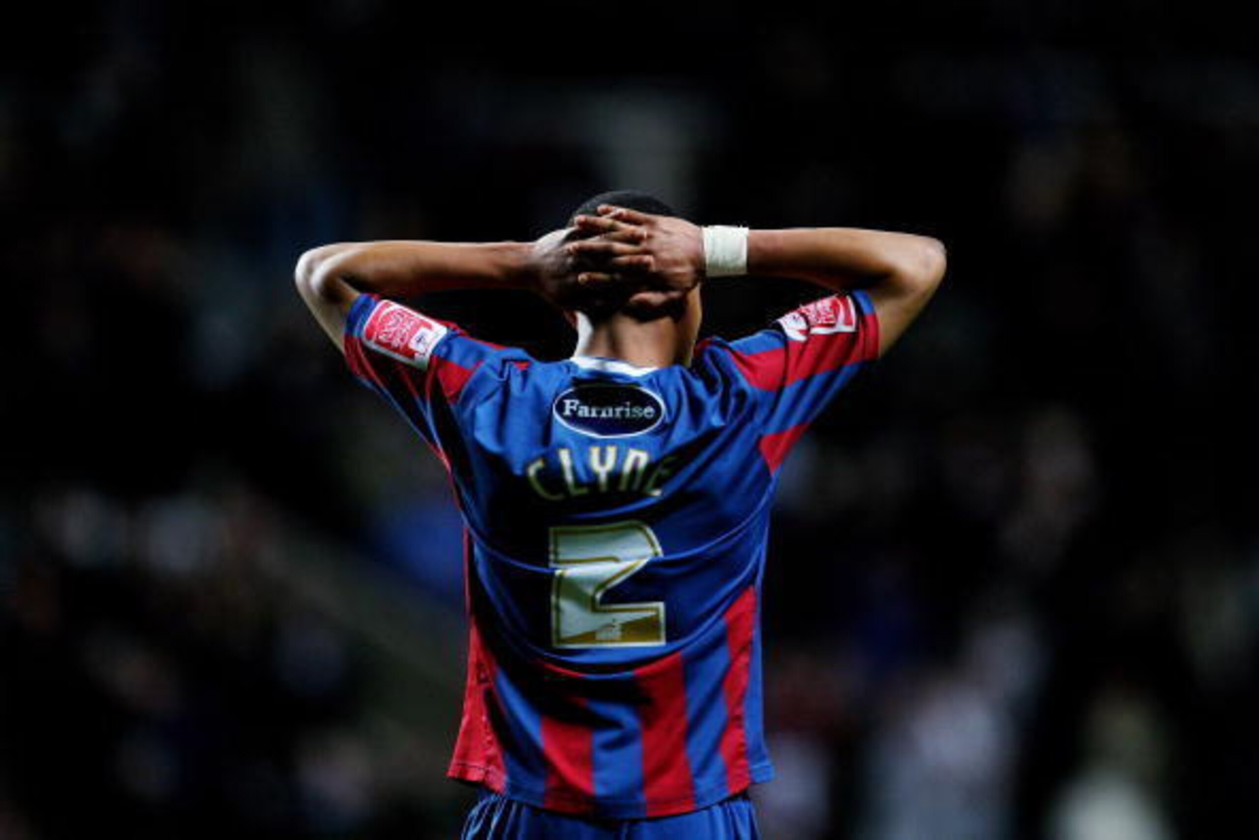 NEWCASTLE UPON TYNE, ENGLAND - JANUARY 27: Dejected Crystal Palace player Nathaniel Clyne holds his head in despair on the final whistle of the Coca-Cola Championship game between Newcastle United and Crystal Palace at St James' Park on January 27, 2010 i