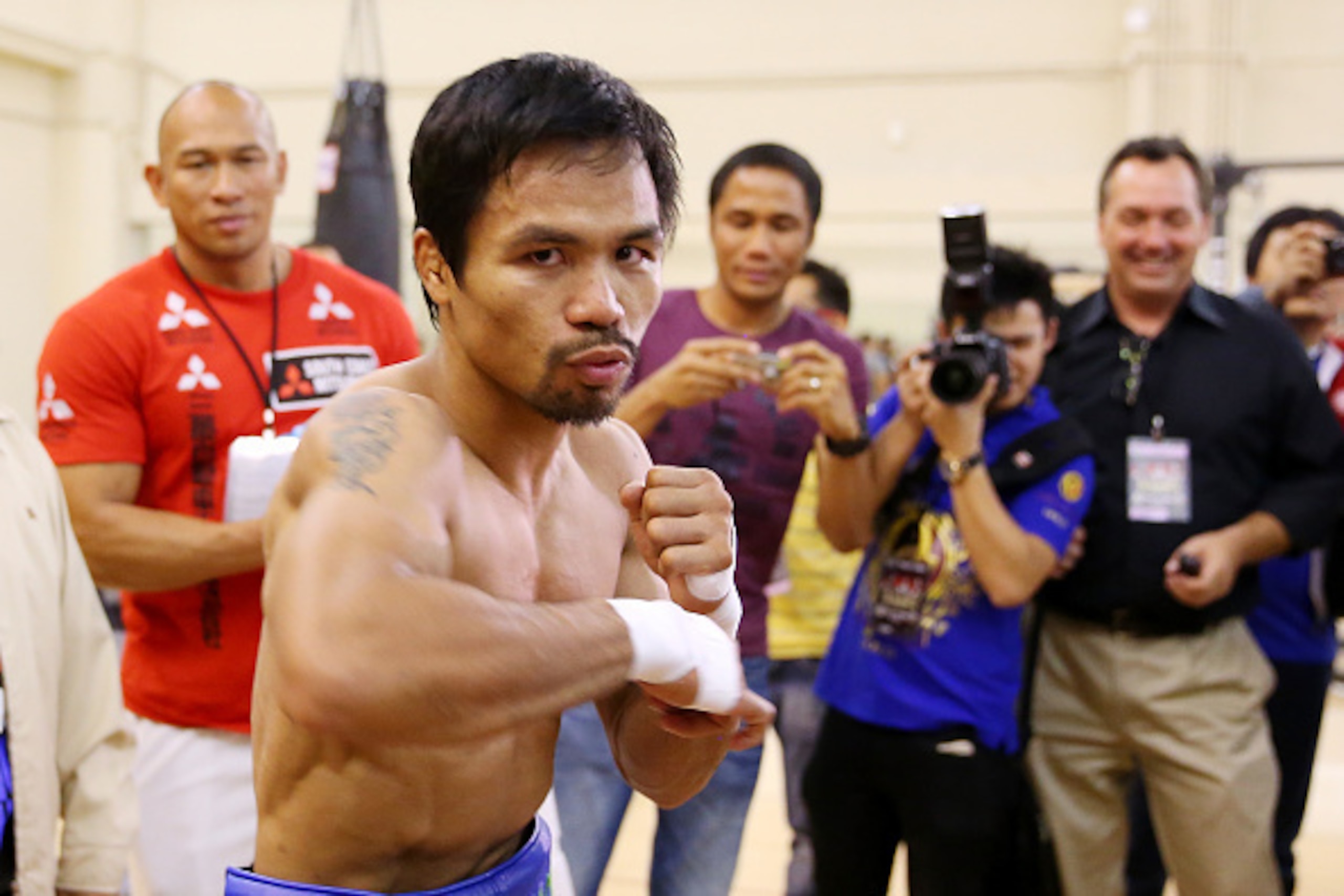 MACAU - NOVEMBER 20:  Manny Pacquiao trains during a workout session at The Venetian on November 20, 2014 in Macau, Macau.  (Photo by Chris Hyde/Getty Images)