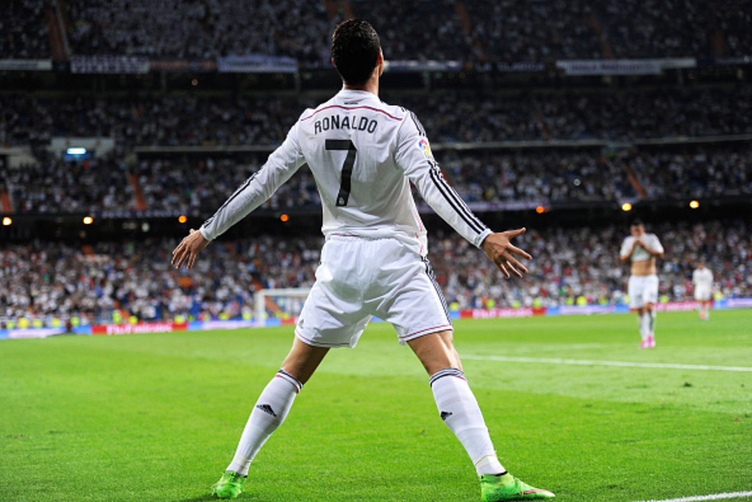 MADRID, SPAIN - OCTOBER 05:  Cristiano Ronaldo of Real Madrid celebrates after scoring his team's 5th and his third goal against Club Athletic during the La Liga match between Real Madrid CF and Athletic Club at Estadio Santiago Bernabeu on October 5, 201