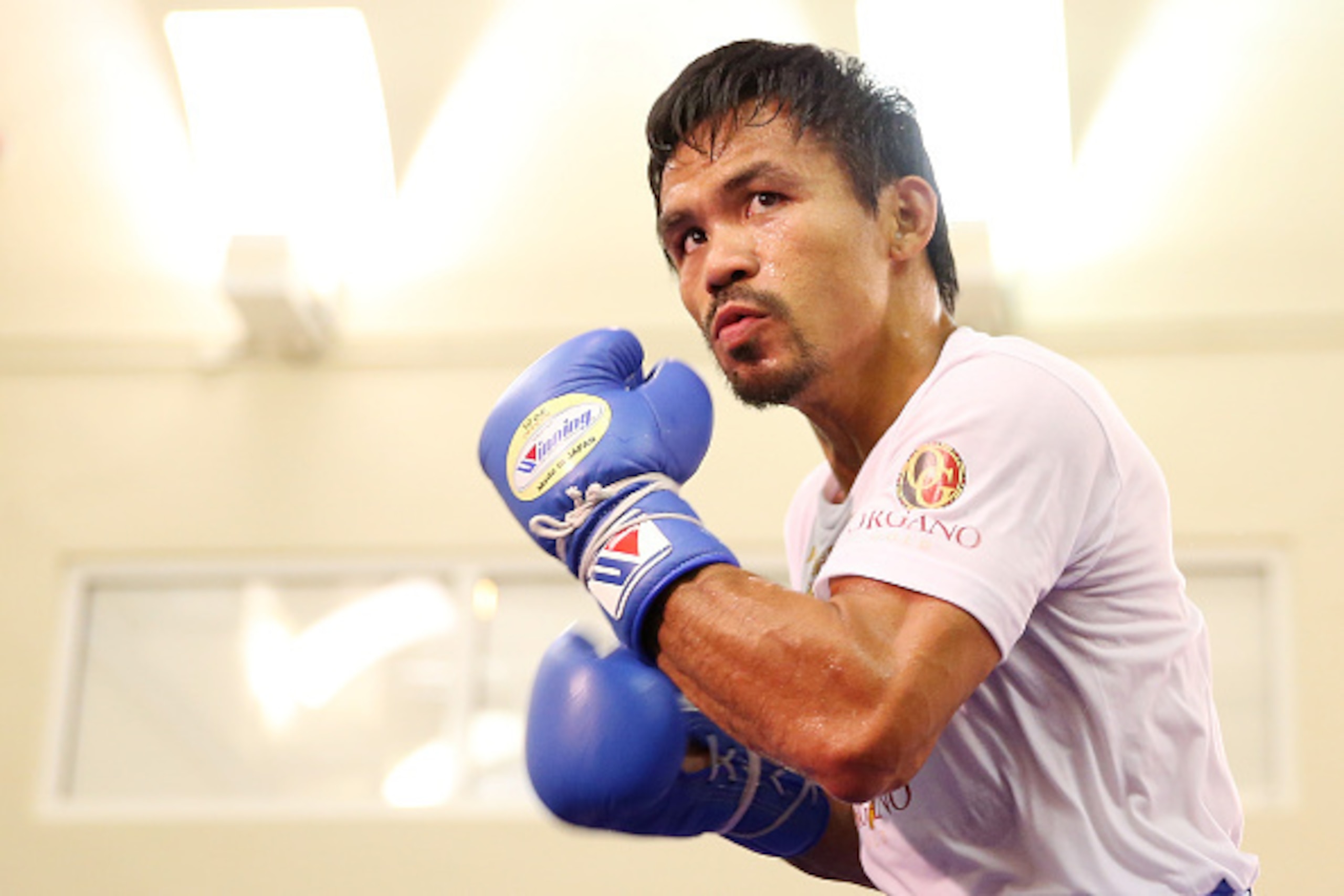 MACAU - NOVEMBER 20:  Manny Pacquiao trains during a workout session at The Venetian on November 20, 2014 in Macau, Macau.  (Photo by Chris Hyde/Getty Images)