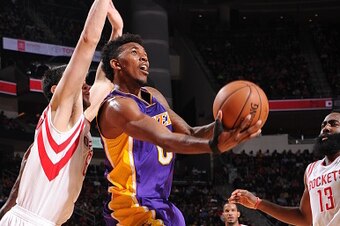 HOUSTON, TX - NOVEMBER 19:  Nick Young #0 of the Los Angeles Lakers shoots against the Houston Rockets on November 19, 2014 at the Toyota Center in Houston, Texas. NOTE TO USER: User expressly acknowledges and agrees that, by downloading and or using this