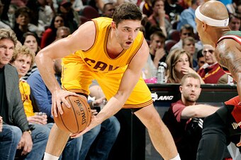 CLEVELAND, OH - OCTOBER 14: Joe Harris #12 of the Cleveland Cavaliers handles the ball against the Milwaukee Bucks at The Quicken Loans Arena on October 14, 2014 in Cleveland, Ohio. NOTE TO USER: User expressly acknowledges and agrees that, by downloading