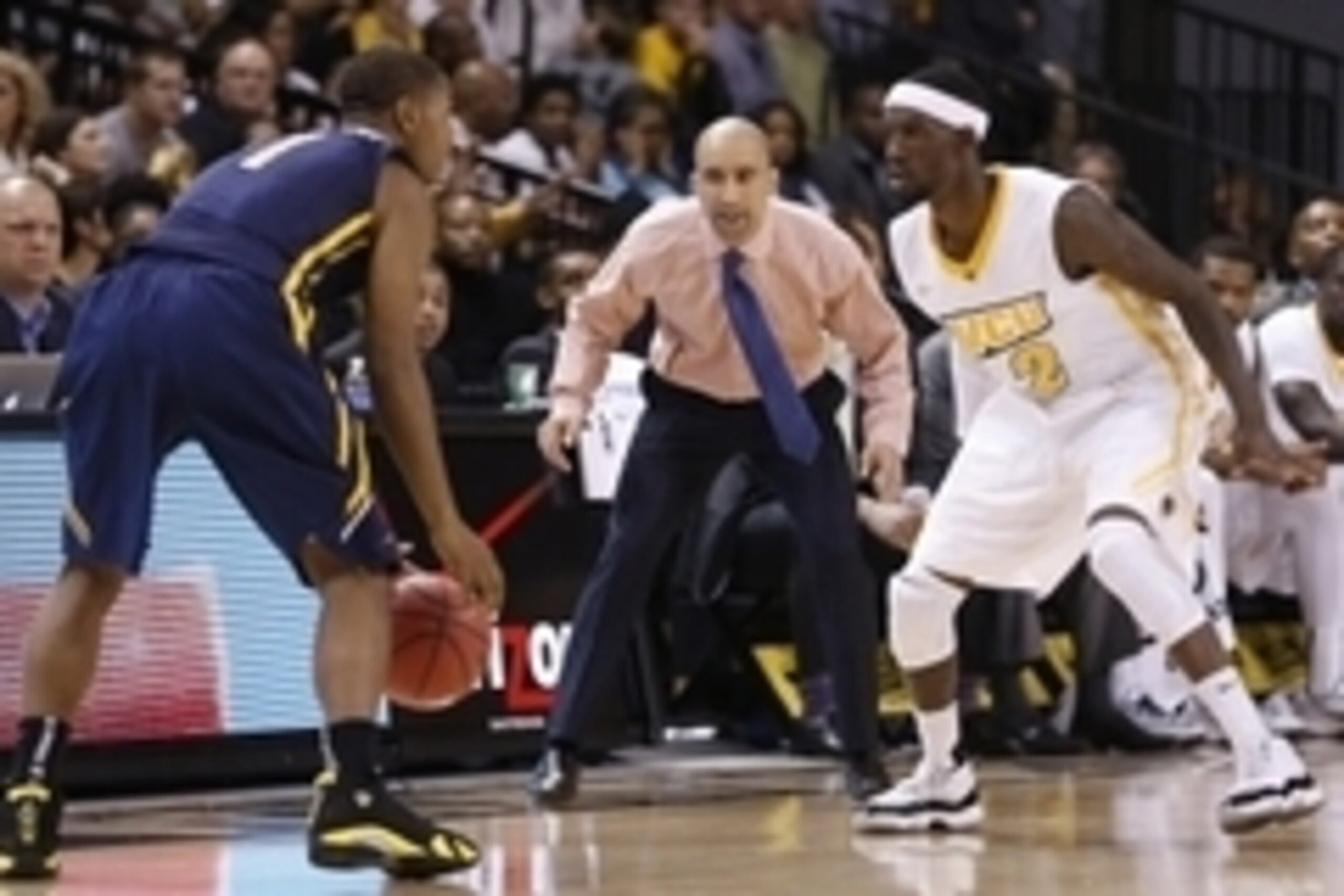 Nov 18, 2014; Richmond, VA, USA; Virginia Commonwealth Rams head coach Shaka Smart (M) watches Rams guard Briante Weber (2) defend against Toledo Rockets guard Jonathan Williams (1) in the first half at Stuart Siegel Center. The Rams won 87-78. Mandatory Nov 18, 2014; Richmond, VA, USA; Virginia Commonwealth Rams head coach Shaka Smart (M) watches Rams guard Briante Weber (2) defend against Toledo Rockets guard Jonathan Williams (1) in the first half at Stuart Siegel Center. The Rams won 87-78. Mandatory