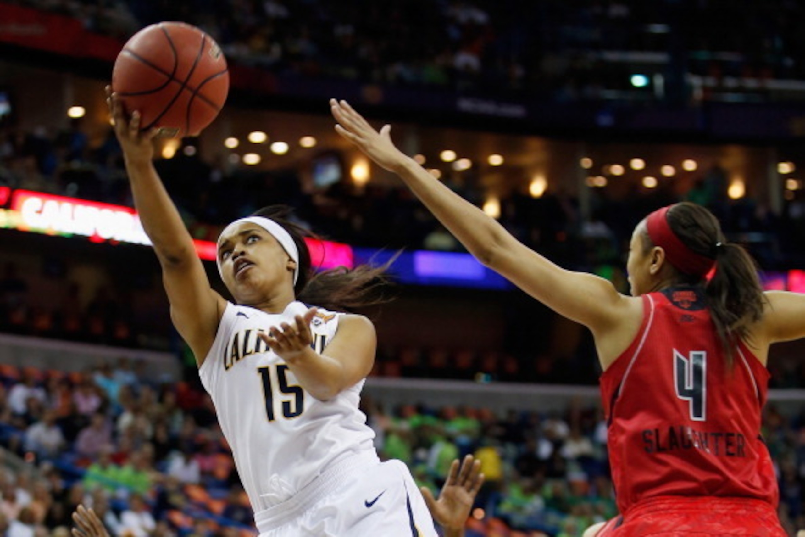 NEW ORLEANS, LA - APRIL 07:  Brittany Boyd #15 of the California Golden Bears shoots the ball over Antonita Slaughter #4 of the Louisville Cardinals during the National Semifinal game of the 2013 NCAA Division I Women's Basketball Championship at the New 