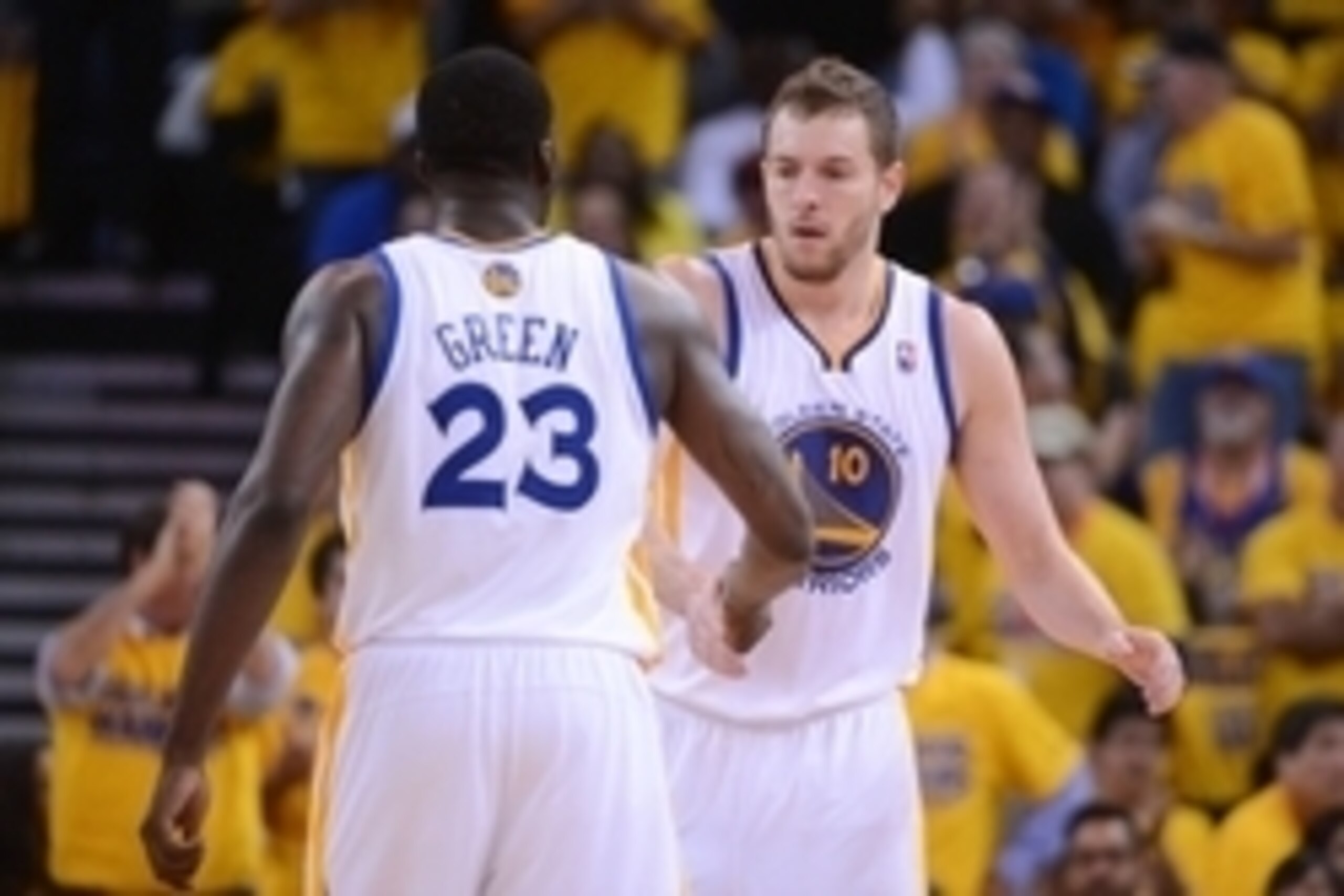 Apr 27, 2014; Oakland, CA, USA; Golden State Warriors forward David Lee (10) celebrates with forward Draymond Green (23) during the second quarter in game four of the first round of the 2014 NBA Playoffs against the Los Angeles Clippers at Oracle Arena. T