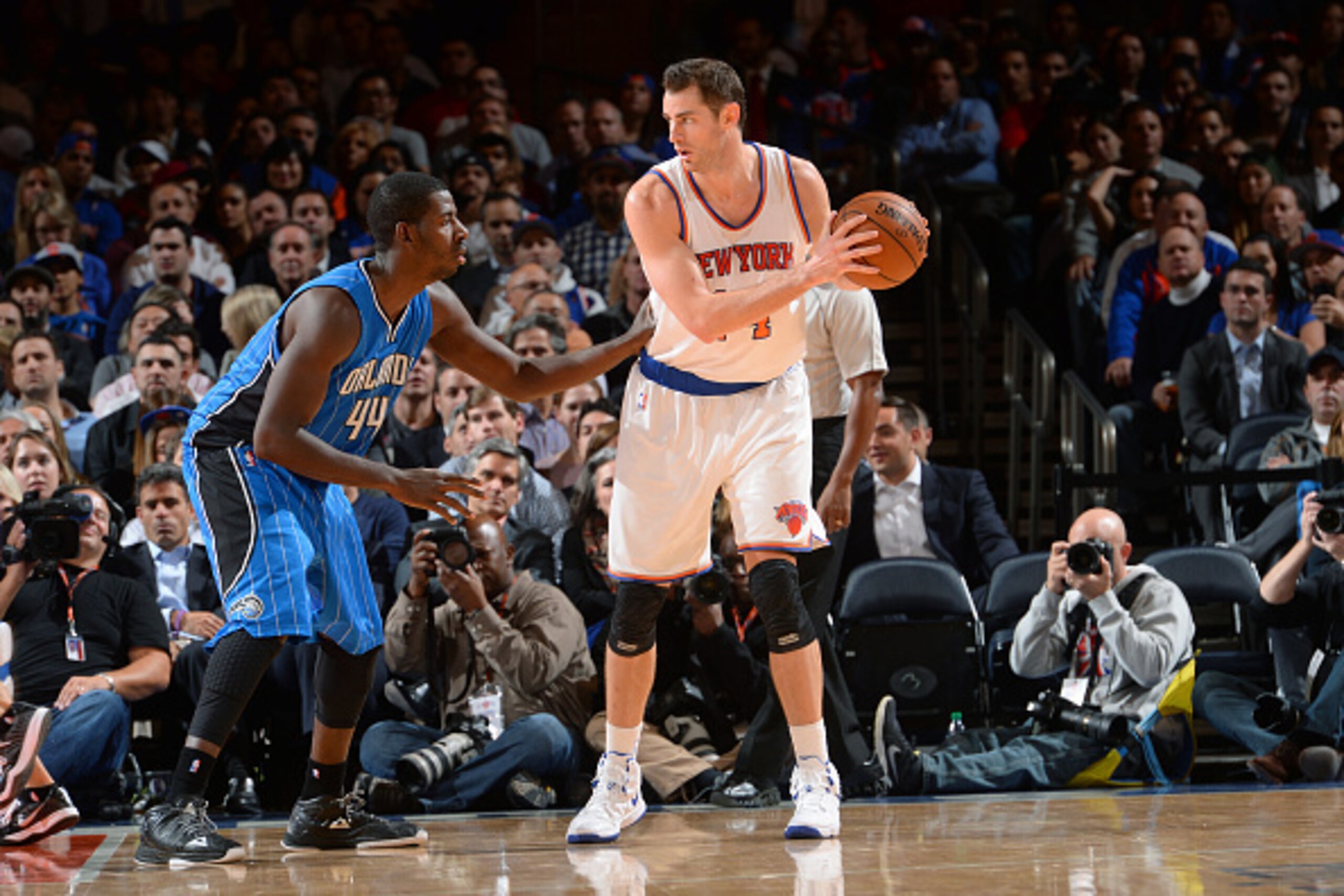 NEW YORK, NY -  NOVEMBER 12: Jason Smith #14 of the New York Knicks defends the ball against Andrew Nicholson #44 of the Orlando Magic during the game on November 12, 2014 at Madison Square Garden in New York, NY. NOTE TO USER: User expressly acknowledges