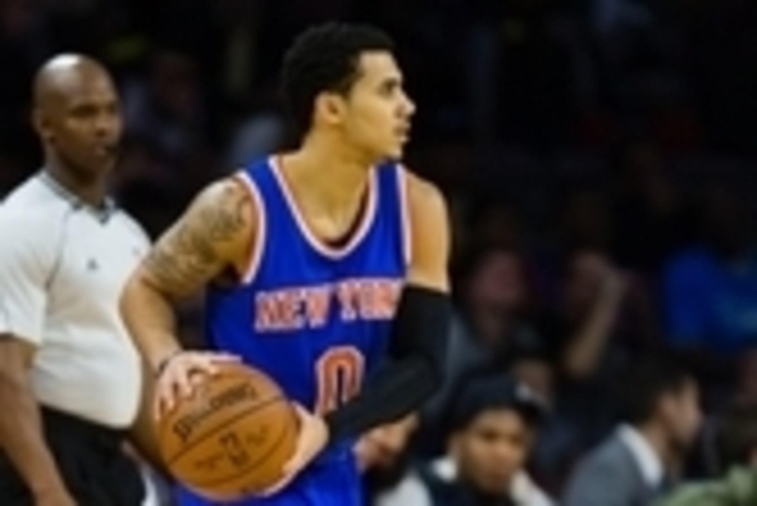 Nov 5, 2014; Auburn Hills, MI, USA; New York Knicks guard Shane Larkin (0) moves the ball against the Detroit Pistons at The Palace of Auburn Hills. Mandatory Credit: Rick Osentoski-USA TODAY Sports