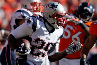 DENVER, CO - JANUARY 19:  LeGarrette Blount #29 of the New England Patriots runs the ball against the Denver Broncos during the AFC Championship game at Sports Authority Field at Mile High on January 19, 2014 in Denver, Colorado.  (Photo by Kevin C. Cox/G