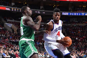 PHILADELPHIA, PA -  NOVEMBER 19:  Nerlens Noel #4 of the Philadelphia 76ers handles the ball against the Boston Celtics on November 19, 2014 at Wells Fargo Center in Philadelphia, Pennsylvania. NOTE TO USER: User expressly acknowledges and agrees that, by