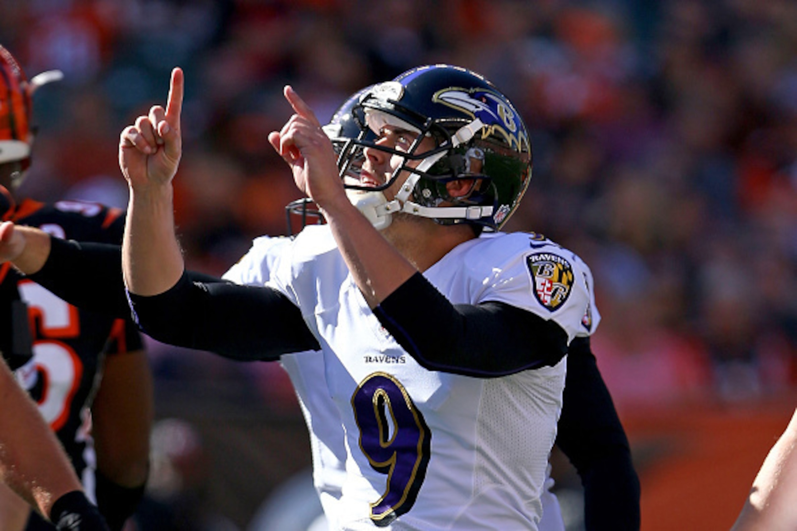 CINCINNATI, OH - OCTOBER 26 :  Justin Tucker #9 of the Baltimore Ravens celebrates after kicking a field goal during the second quarter of the game against the Cincinnati Bengals at Paul Brown Stadium on October 26, 2014 in Cincinnati, Ohio. (Photo by And