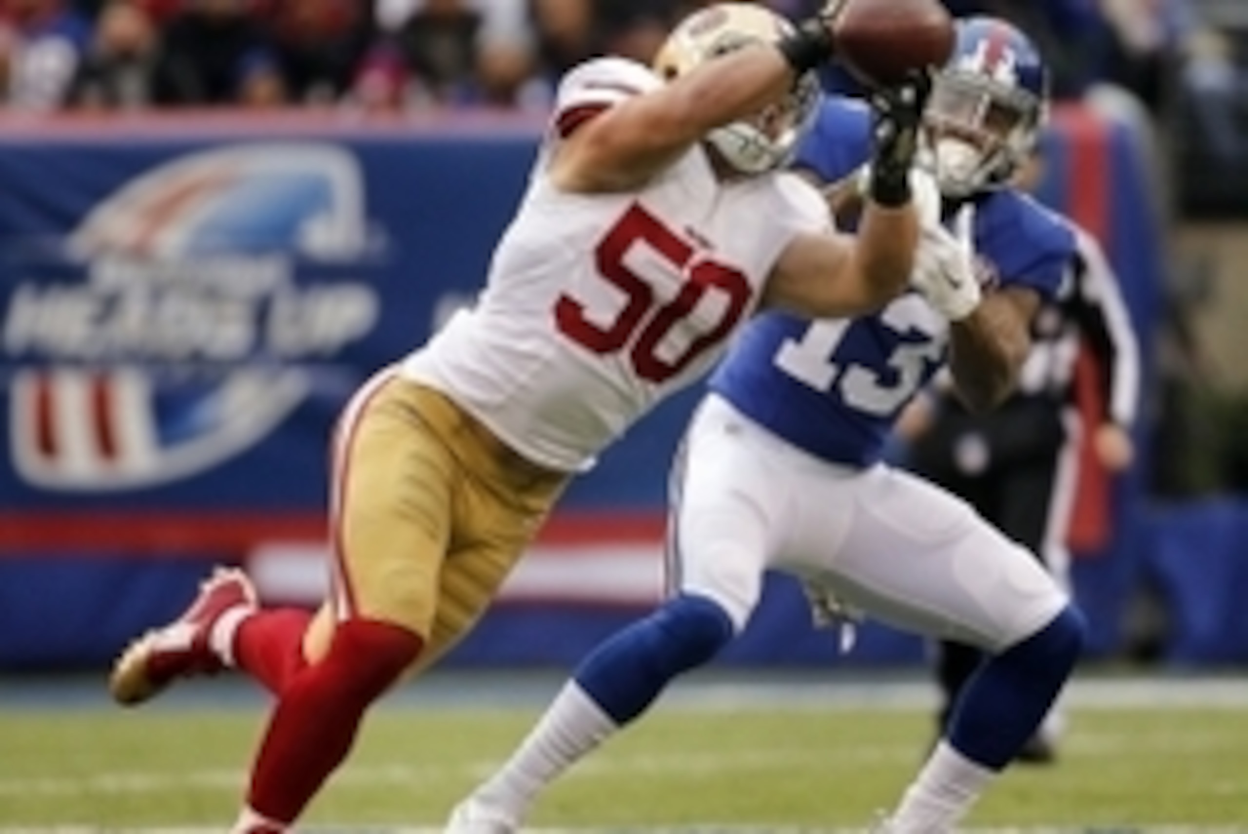 Sep 25, 2014; New York, NY, USA; San Francisco 49ers inside linebacker Chris Borland (50) intercepts a pass intended for New York Giants wide receiver Odell Beckham (13) during the first half at Metlife Stadium. Mandatory Credit: John Munson/NJ Advance Me Sep 25, 2014; New York, NY, USA; San Francisco 49ers inside linebacker Chris Borland (50) intercepts a pass intended for New York Giants wide receiver Odell Beckham (13) during the first half at Metlife Stadium. Mandatory Credit: John Munson/NJ Advance Me