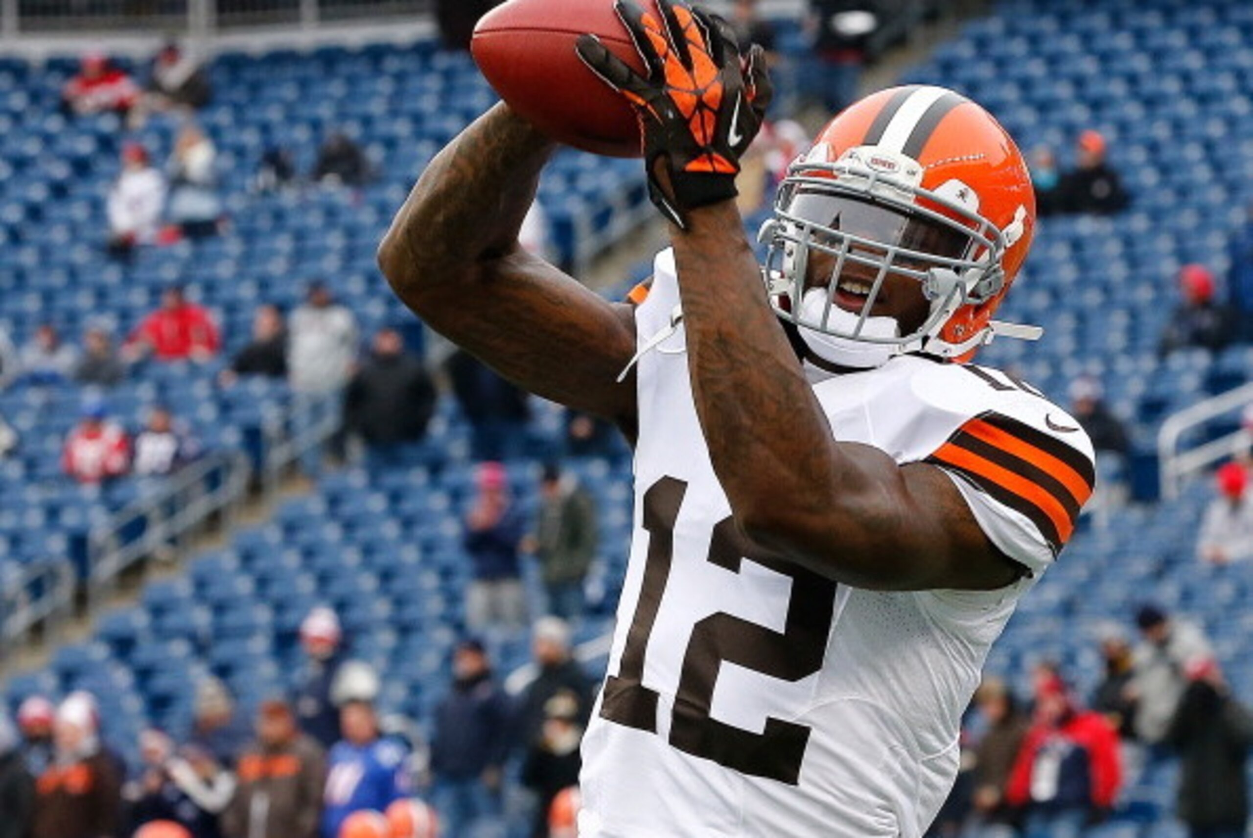 FOXBORO, MA - DECEMBER 8:  Josh Gordon #12 of the Cleveland Browns catches a pass before a game with the New England Patriots at Gillette Stadium on December 8, 2013 in Foxboro, Massachusetts. (Photo by Jim Rogash/Getty Images)