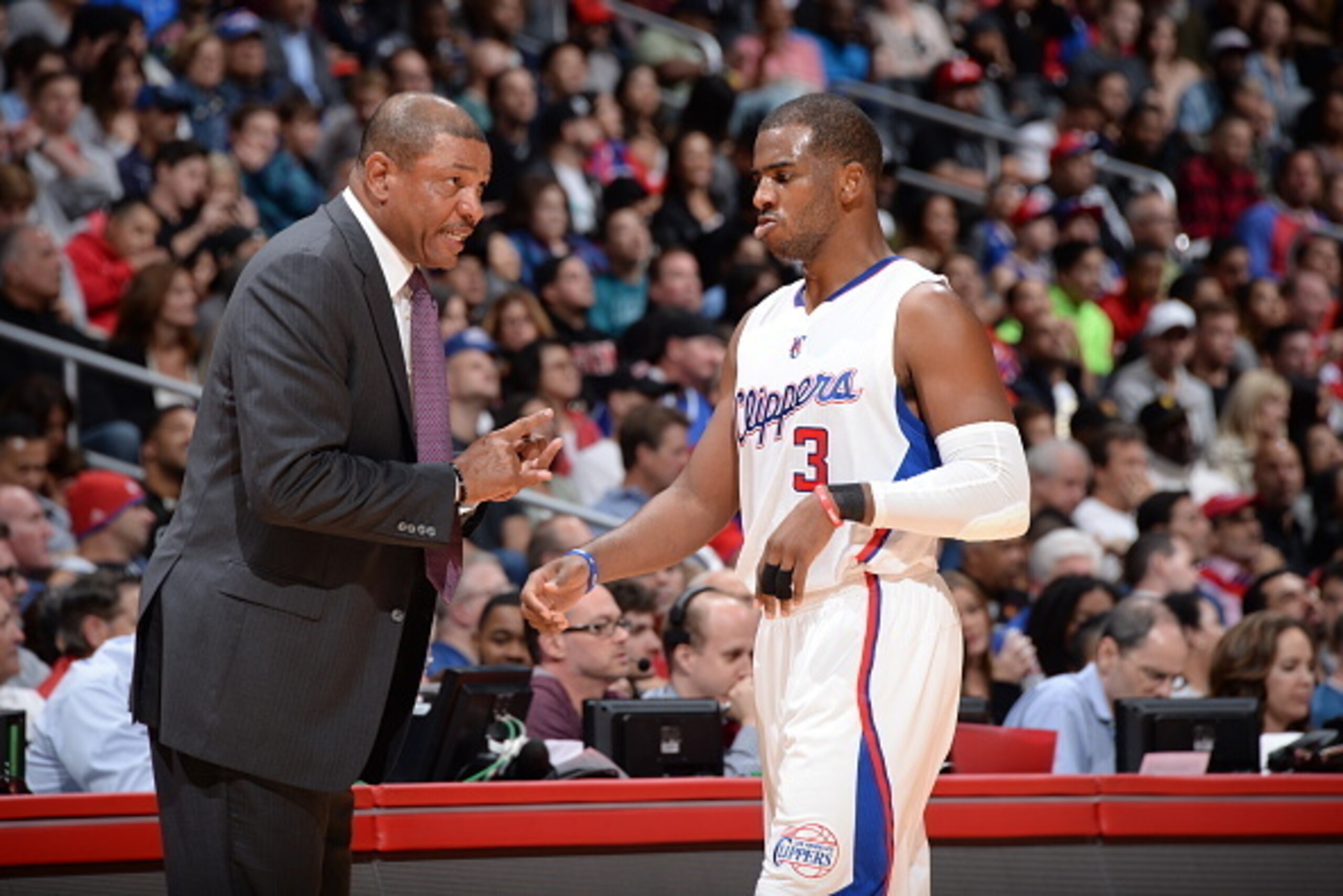 LOS ANGELES, LA -  NOVEMBER 15: Chris Paul #3 and Doc Rivers of the Los Angeles Clippers talk against the Phoenix Suns during the game on November 15, 2014 at STAPLES CENTER in Los Angeles, California. NOTE TO USER: User expressly acknowledges and agrees 