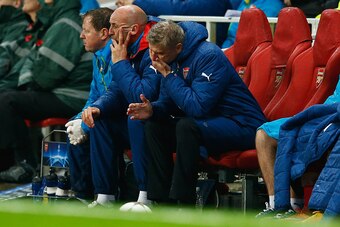 LONDON, ENGLAND - NOVEMBER 04:  Arsene Wenger, manager of Arsenal reacts on the bench as a 3-0 lead is lost during the UEFA Champions League Group D match between Arsenal FC and RSC Anderlecht at Emirates Stadium on November 4, 2014 in London, United King