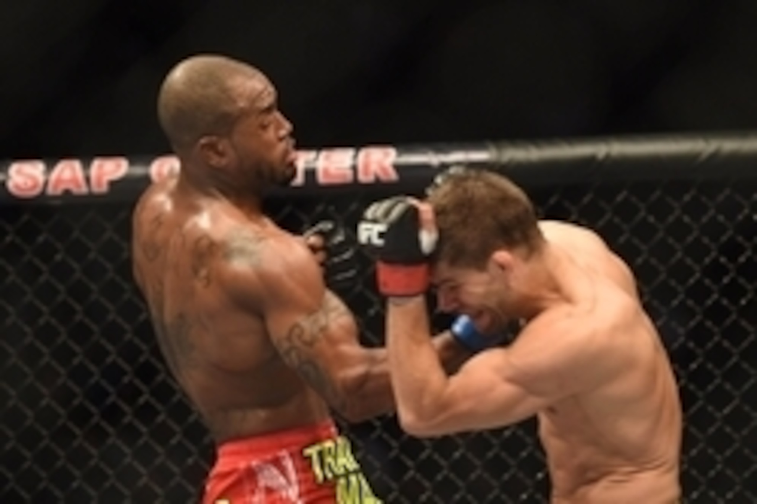 July 26, 2014; San Jose, CA, USA; Josh Thomson (red gloves) is punched by Bobby Green (blue gloves) during the lightweight bout of the FOX UFC Saturday at SAP Center. Mandatory Credit: Kyle Terada-USA TODAY Sports