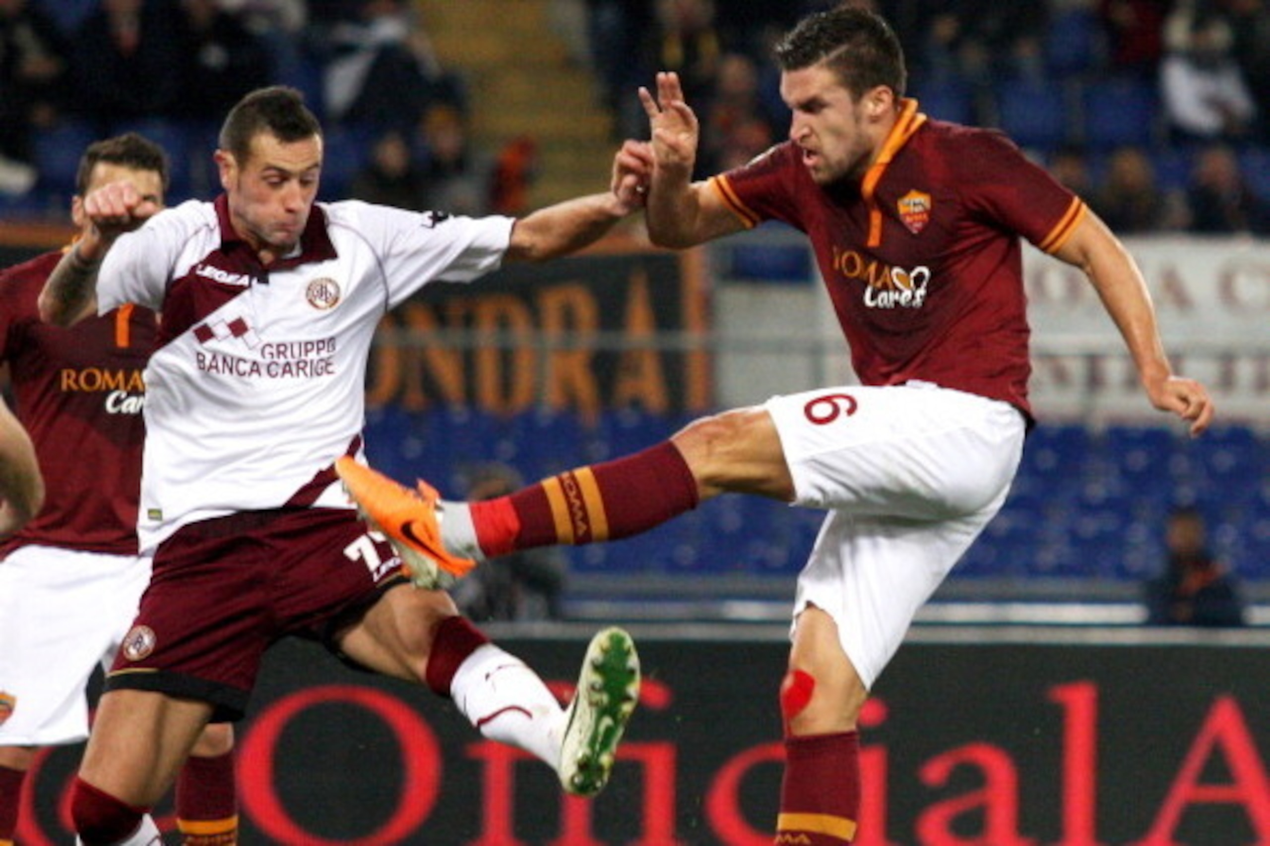 ROME, ITALY - JANUARY 18: Kevin Strootman of AS Roma scores the second team's goal during the Serie A match between AS Roma and AS Livorno Calcio at Stadio Olimpico on January 18, 2014 in Rome, Italy. (Photo by Paolo Bruno/Getty Images) ROME, ITALY - JANUARY 18: Kevin Strootman of AS Roma scores the second team's goal during the Serie A match between AS Roma and AS Livorno Calcio at Stadio Olimpico on January 18, 2014 in Rome, Italy. (Photo by Paolo Bruno/Getty Images)