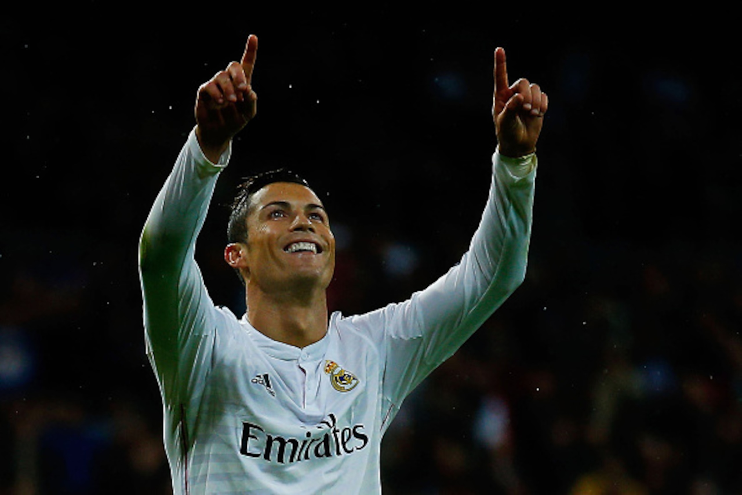MADRID, SPAIN - NOVEMBER 08: Cristiano Ronaldo of Real Madrid CF celebrates scoring their fifth goal during the La Liga match between Real Madrid CF and Rayo Vallecano de Madrid at Estadio Santiago Bernabeu on November 8, 2014 in Madrid, Spain. (Photo b MADRID, SPAIN - NOVEMBER 08: Cristiano Ronaldo of Real Madrid CF celebrates scoring their fifth goal during the La Liga match between Real Madrid CF and Rayo Vallecano de Madrid at Estadio Santiago Bernabeu on November 8, 2014 in Madrid, Spain. (Photo b