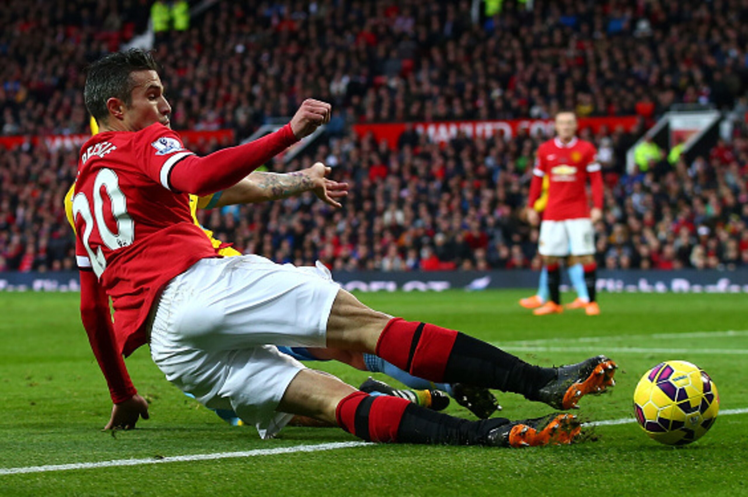 MANCHESTER, ENGLAND - NOVEMBER 08: Robin van Persie of Manchester United slides in for the ball during the Barclays Premier League match between Manchester United and Crystal Palace at Old Trafford on November 8, 2014 in Manchester, England. (Photo by C MANCHESTER, ENGLAND - NOVEMBER 08: Robin van Persie of Manchester United slides in for the ball during the Barclays Premier League match between Manchester United and Crystal Palace at Old Trafford on November 8, 2014 in Manchester, England. (Photo by C