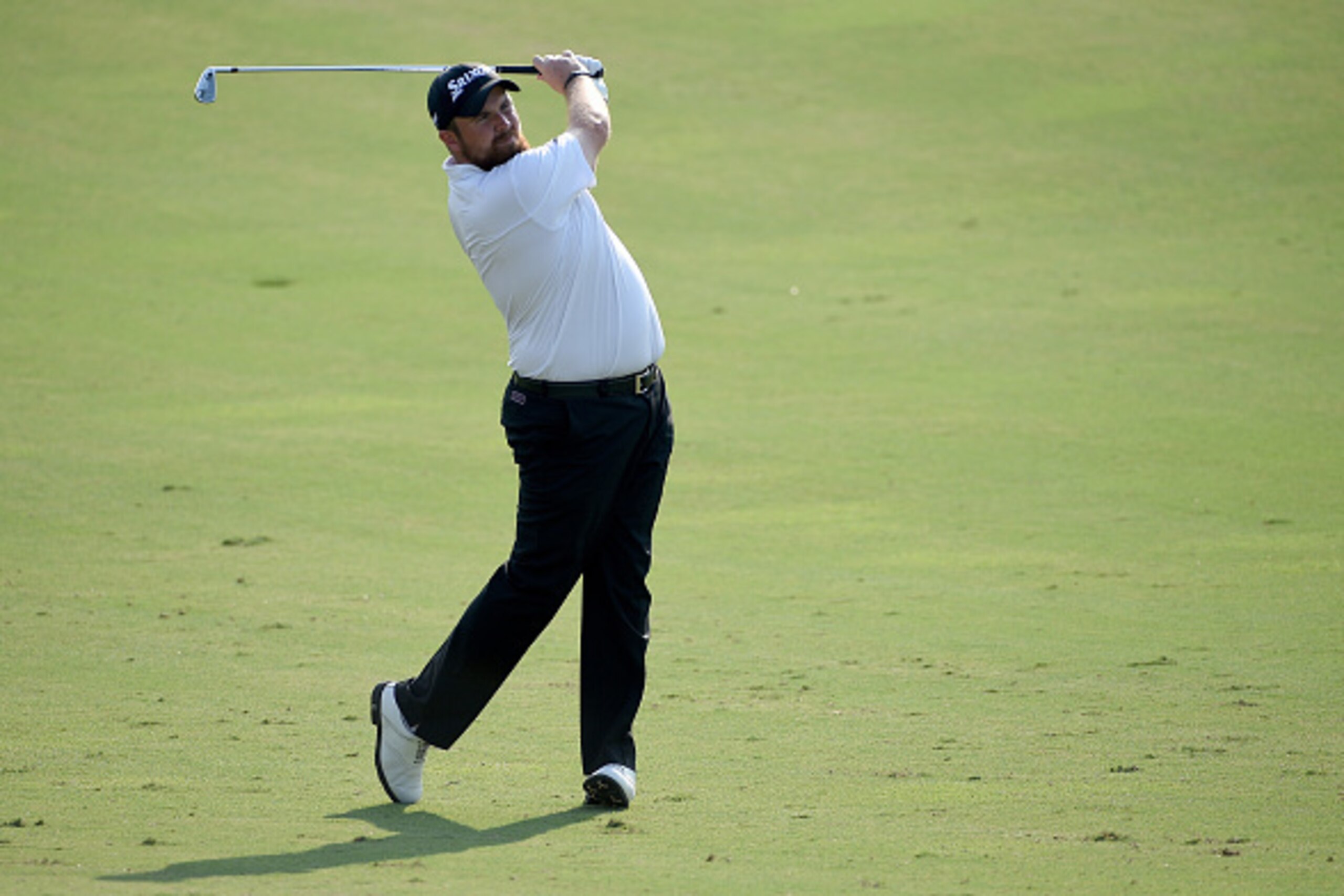 DUBAI, UNITED ARAB EMIRATES - NOVEMBER 21:  Shane Lowry of Northern Ireland on the par four 12th hole during the second round of the DP World Tour Championship at the Jumeirah Golf Estates on November 21, 2014 in Dubai, United Arab Emirates.  (Photo by Ro