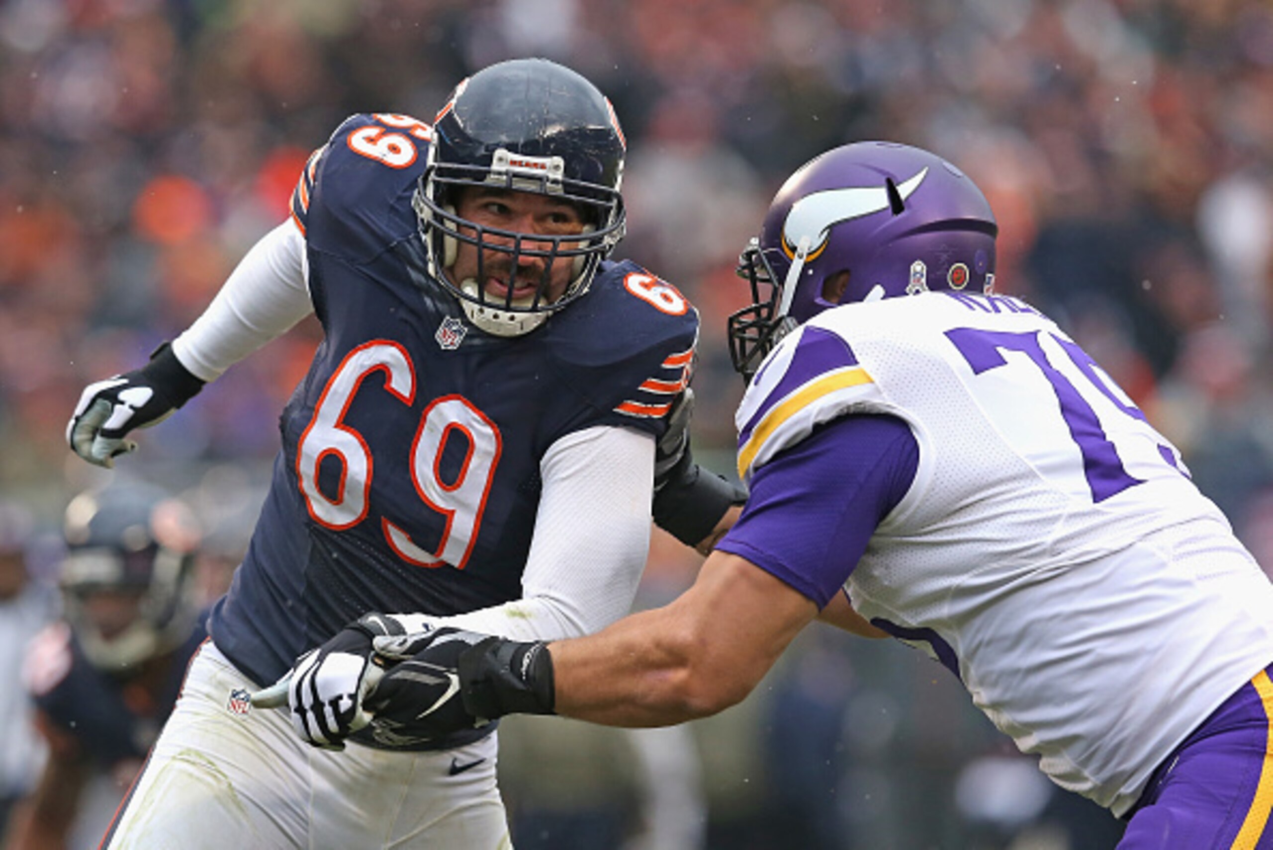 CHICAGO, IL - NOVEMBER 16:  Jared Allen #69 of the Chicago Bears rushes against Michael Harris #79 of the Minnesota Vikings at Soldier Field on October 19, 2014 in Chicago, Illinois. The Bears defeated the Vikings 21-13.  (Photo by Jonathan Daniel/Getty I