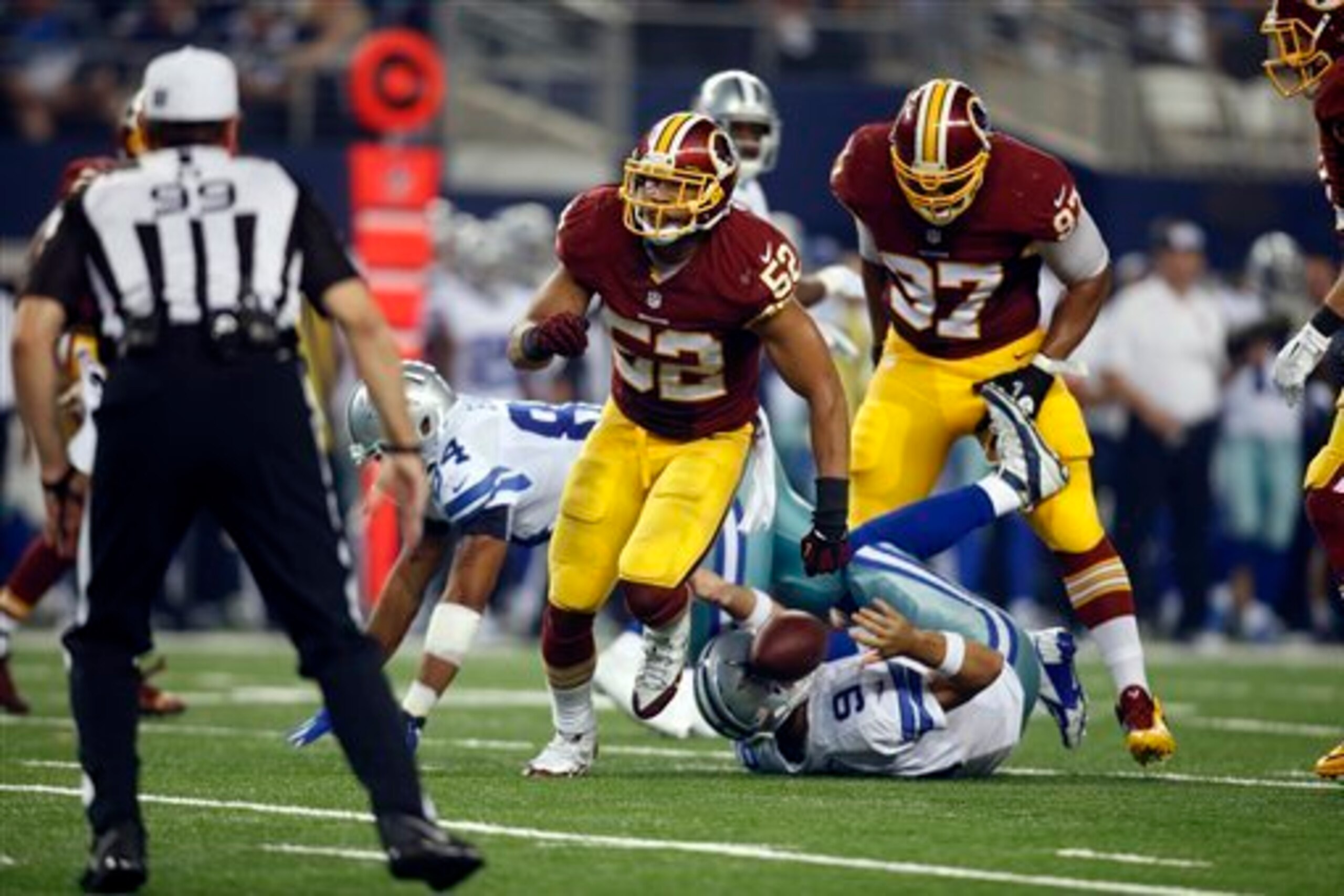Keenan Robinson (No. 52) and Jason Hatcher (No. 97) have made a number of key plays in the backfield for the Washington Redskins in 2014.
