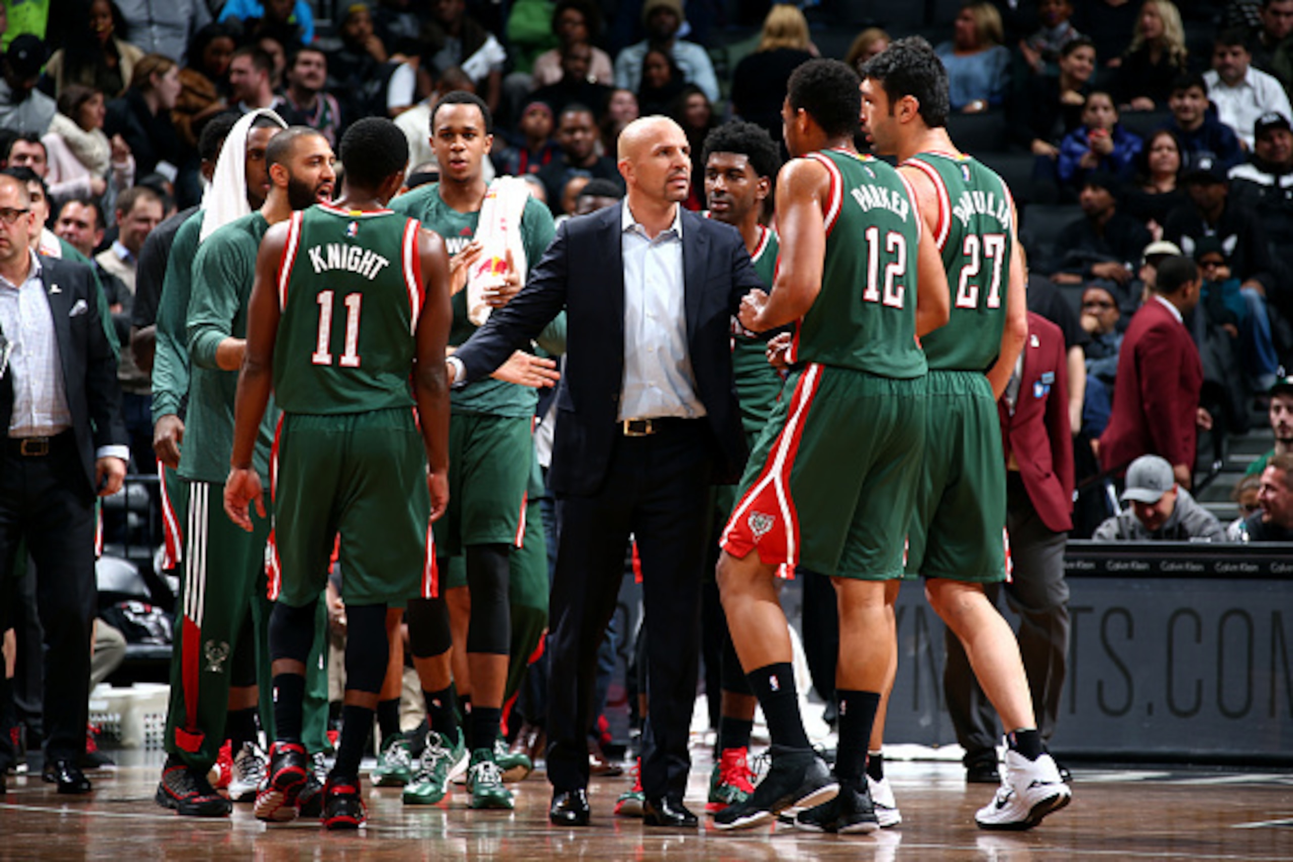 NEW YORK, NY - NOVEMBER 19: Head Coach Jason Kidd and the Milwaukee Bucks speak during a game against the Brooklyn Nets at the Barclays Center on November 19, 2014 in in the Brooklyn borough of New York City, New York. NOTE TO USER: User expressly acknowl