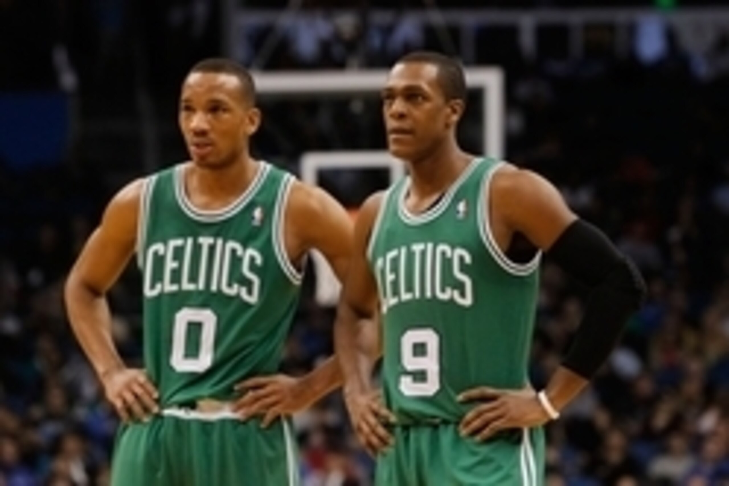 Jan 19, 2014; Orlando, FL, USA; Boston Celtics point guard Rajon Rondo (9) and point guard Avery Bradley (0) against the Orlando Magic during the second half at Amway Center. Orlando Magic defeated the Boston Celtics 93-91. Mandatory Credit: Kim Klement-U