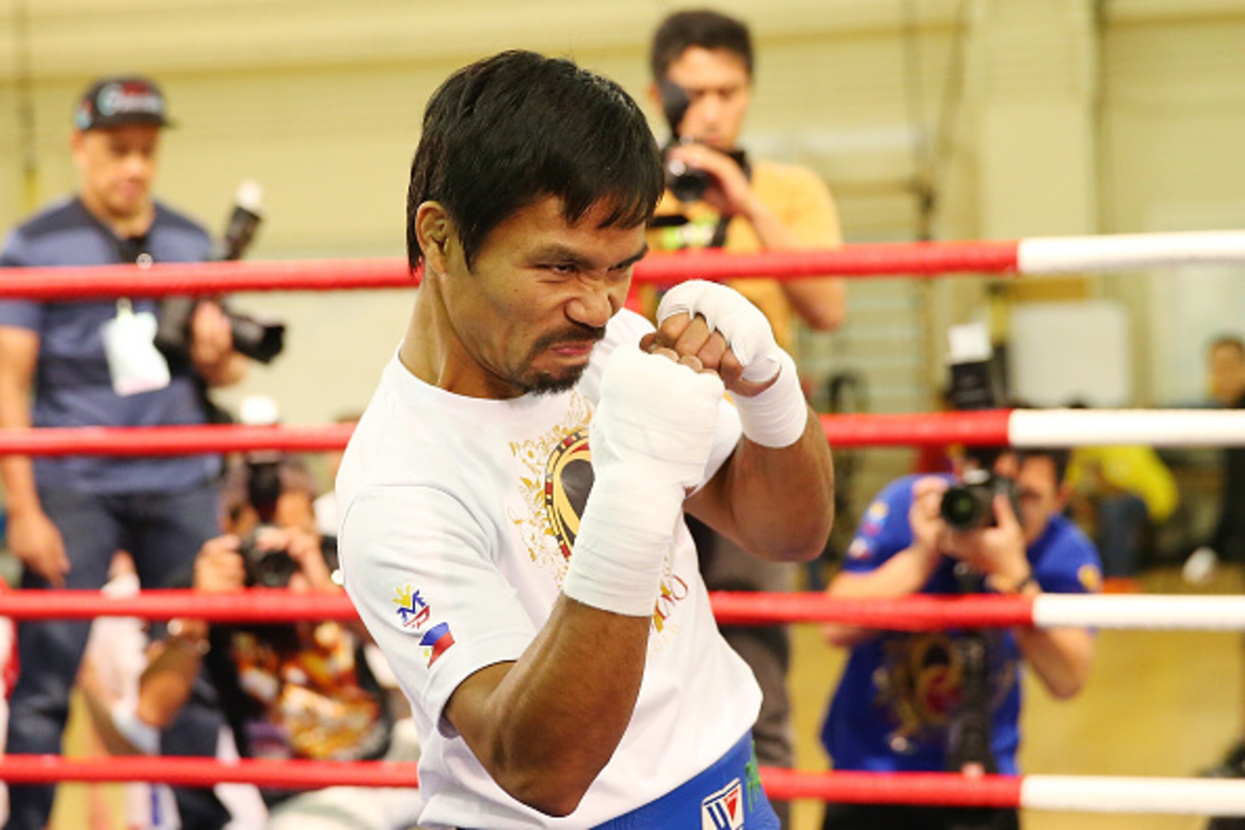 MACAU - NOVEMBER 20:  Manny Pacquiao trains during a workout session at The Venetian on November 20, 2014 in Macau, Macau.  (Photo by Chris Hyde/Getty Images)