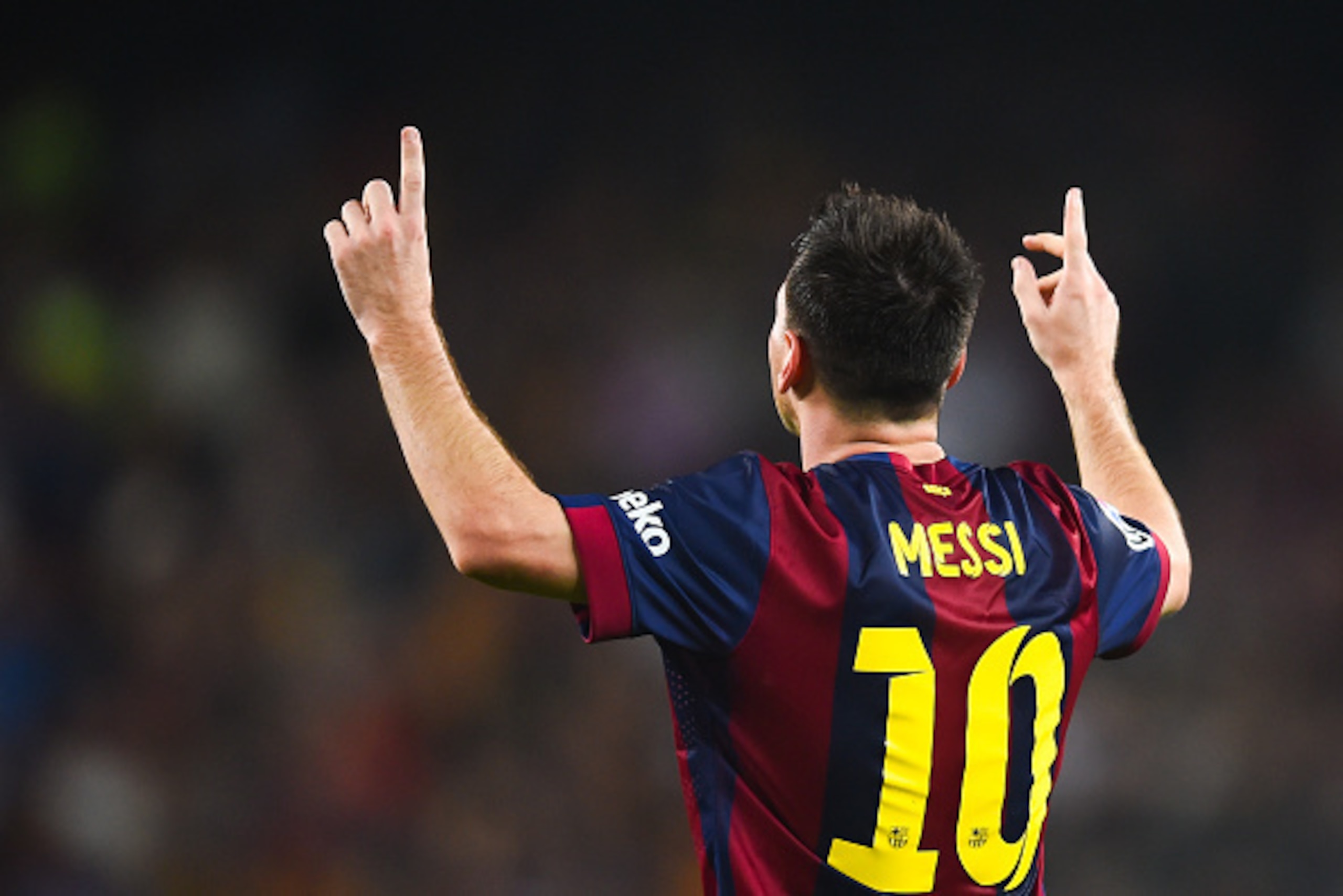 BARCELONA, SPAIN - OCTOBER 18:  Lionel Messi of FC Barcelona celebrates after scoring his team's third goal during the La Liga match between FC Barcelona and SD Eibar at Camp Nou on October 18, 2014 in Barcelona, Spain.  (Photo by David Ramos/Getty Images