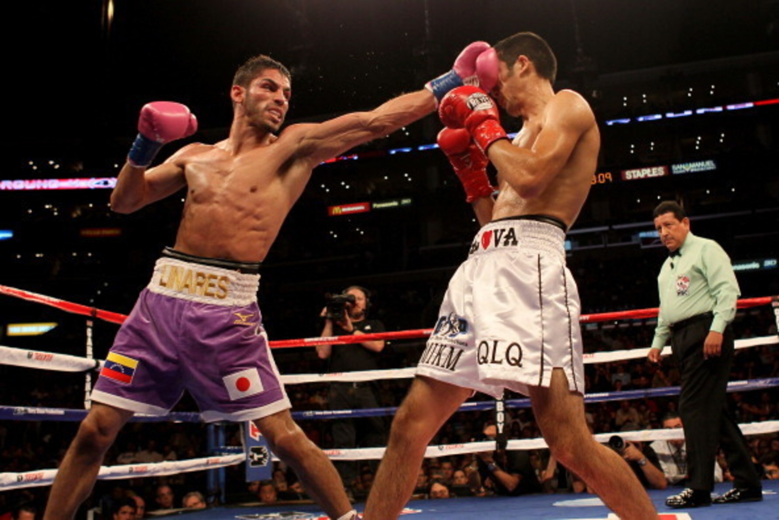 LOS ANGELES, CA - OCTOBER 15:  Jorge Linares of Venezuela (L) lands a punch on Antonio DeMarco of Mexico in their WBC lightweight title fight at Staples Center on October 15, 2011 in Los Angeles, California. DeMarco won in an eleventh round TKO.  (Photo b