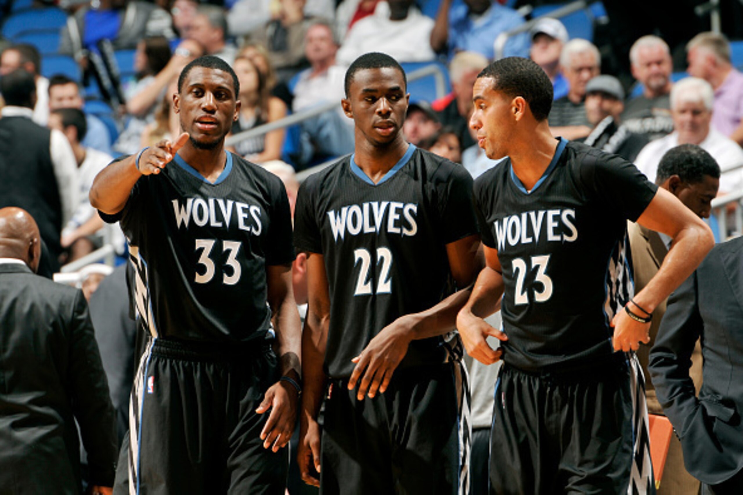 ORLANDO, FL - NOVEMBER 7: Thaddeus Young #33, Andrew Wiggins #22, and Kevin Martin #23 of the Minnesota Timberwolves stand on the court during a game against the Orlando Magic on November 7, 2014 at Amway Center in Orlando, Florida. NOTE TO USER: User exp