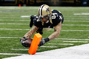 NEW ORLEANS, LA - NOVEMBER 16:  Kenny Stills #84 of the New Orleans Saints scores a touchdown against the Cincinnati Bengals during the second half at Mercedes-Benz Superdome on November 16, 2014 in New Orleans, Louisiana.  (Photo by Kevin C. Cox/Getty Im