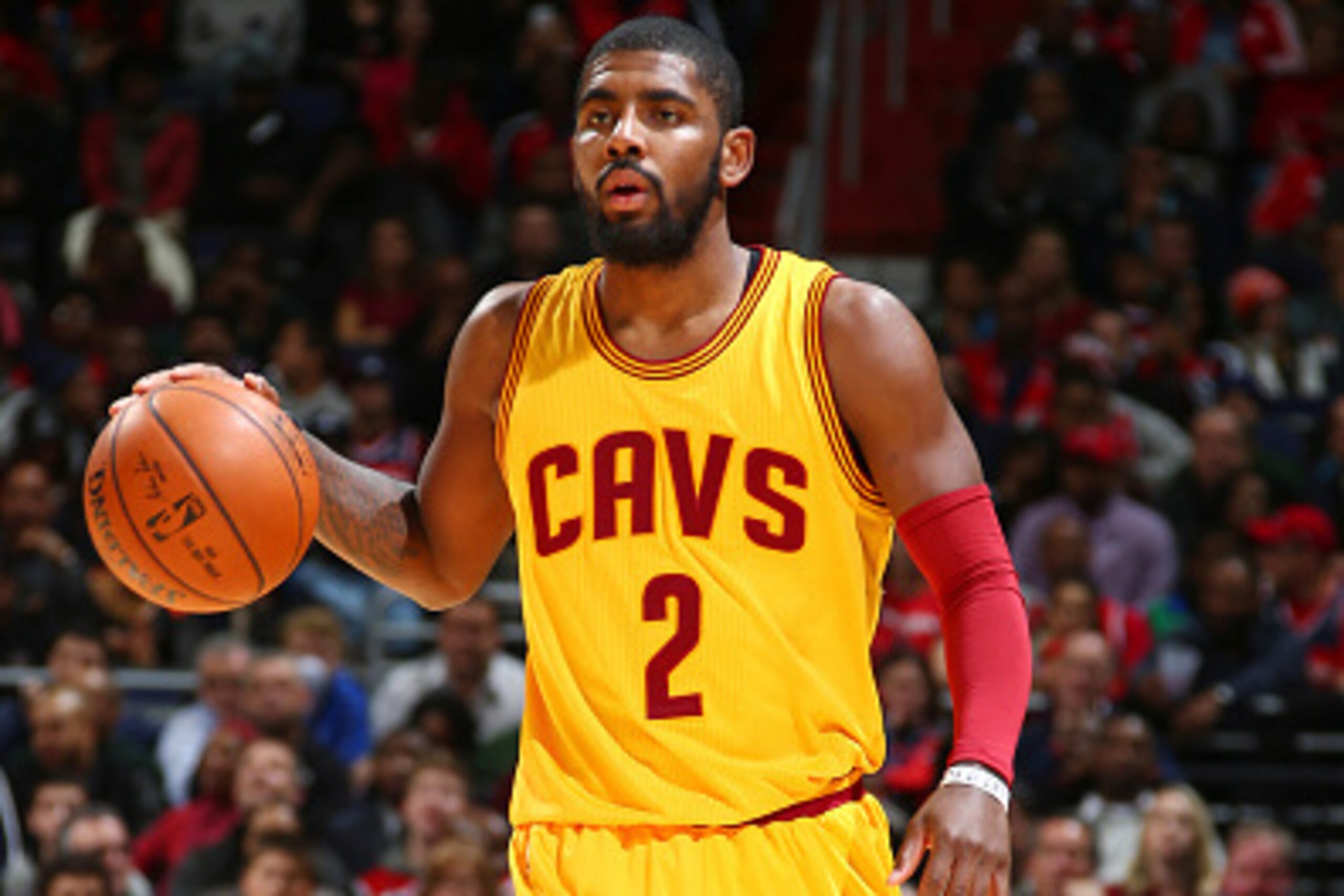 WASHINGTON, DC -  NOVEMBER 21: Kyrie Irving #2 of the Cleveland Cavaliers handles the ball against the Washington WIzards on November 21, 2014 at Verizon Center in Washington, DC. NOTE TO USER: User expressly acknowledges and agrees that, by downloading a