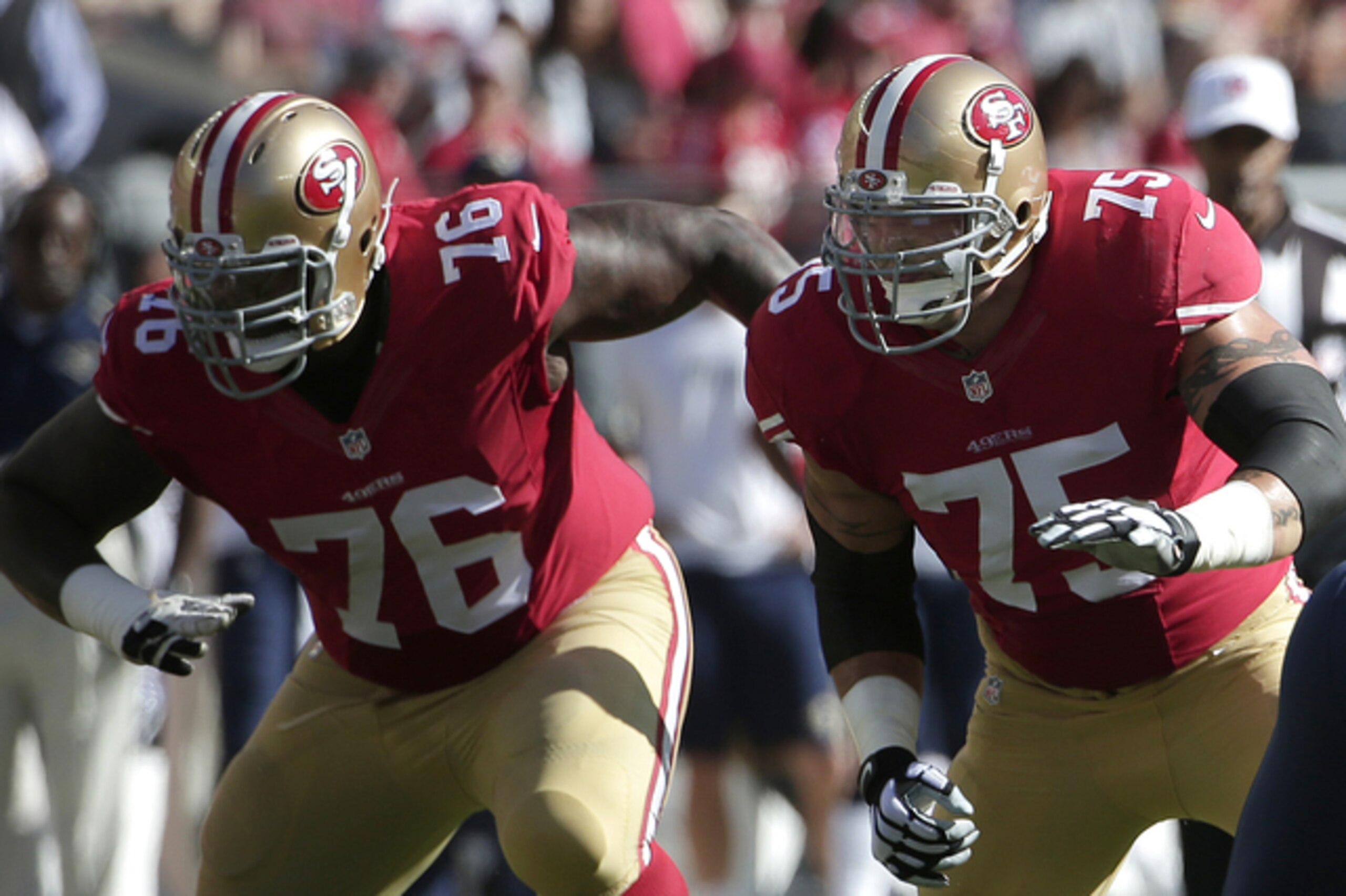 Anthony Davis (left) will miss Sunday's game.