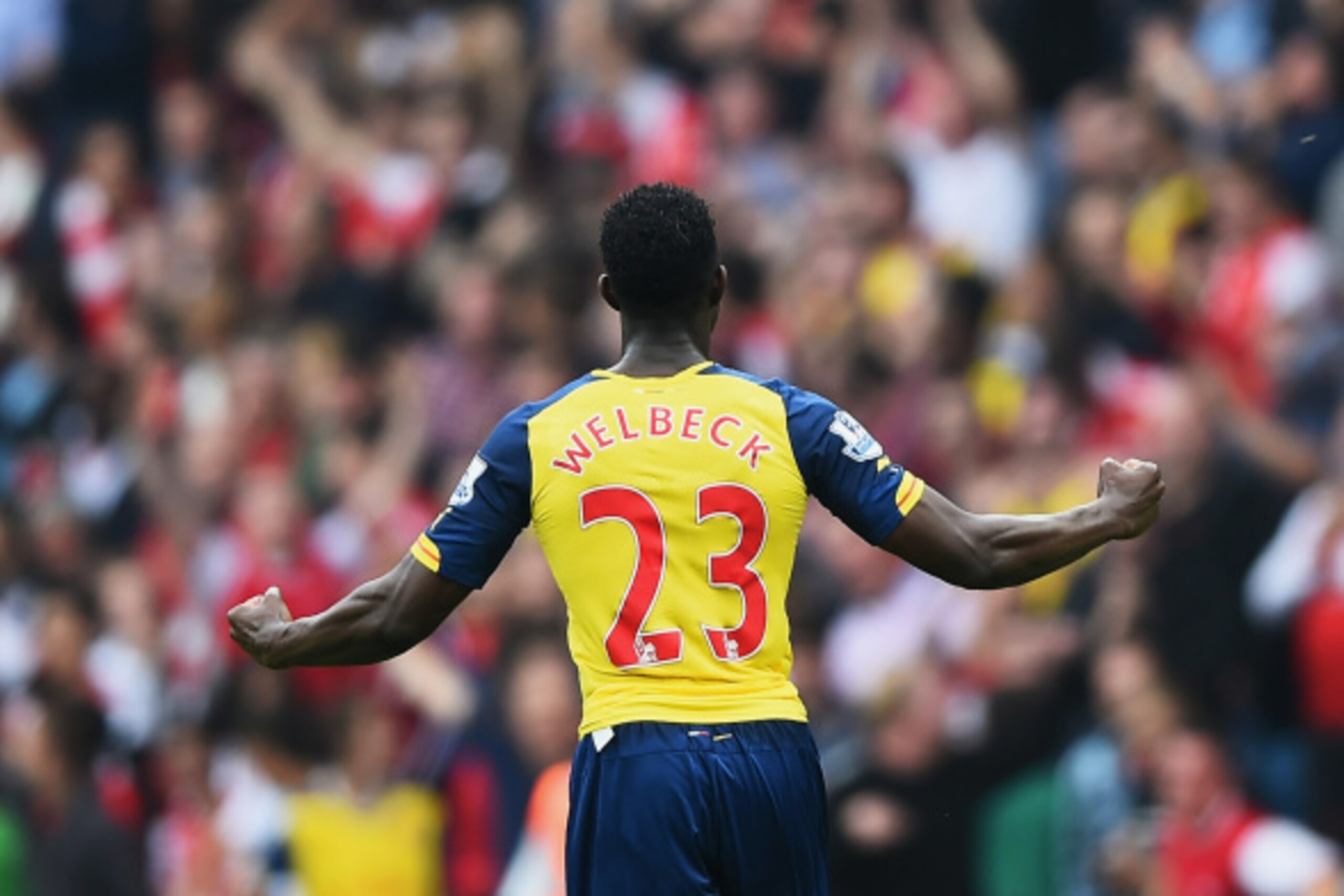 BIRMINGHAM, ENGLAND - SEPTEMBER 20:  Danny Welbeck of Arsenal celebrates his team's second goal during the Barclays Premier League match between Aston Villa and Arsenal at Villa Park on September 20, 2014 in Birmingham, England.  (Photo by Laurence Griffi