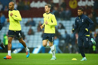 BIRMINGHAM, ENGLAND - NOVEMBER 02: Younes Kaboul, Jan Vertonghen and Kyle Naughton of Spurs warm up prior to the Barclays Premier League match between Aston Villa and Tottenham Hotspur at Villa Park on November 2, 2014 in Birmingham, England.  (Photo by R